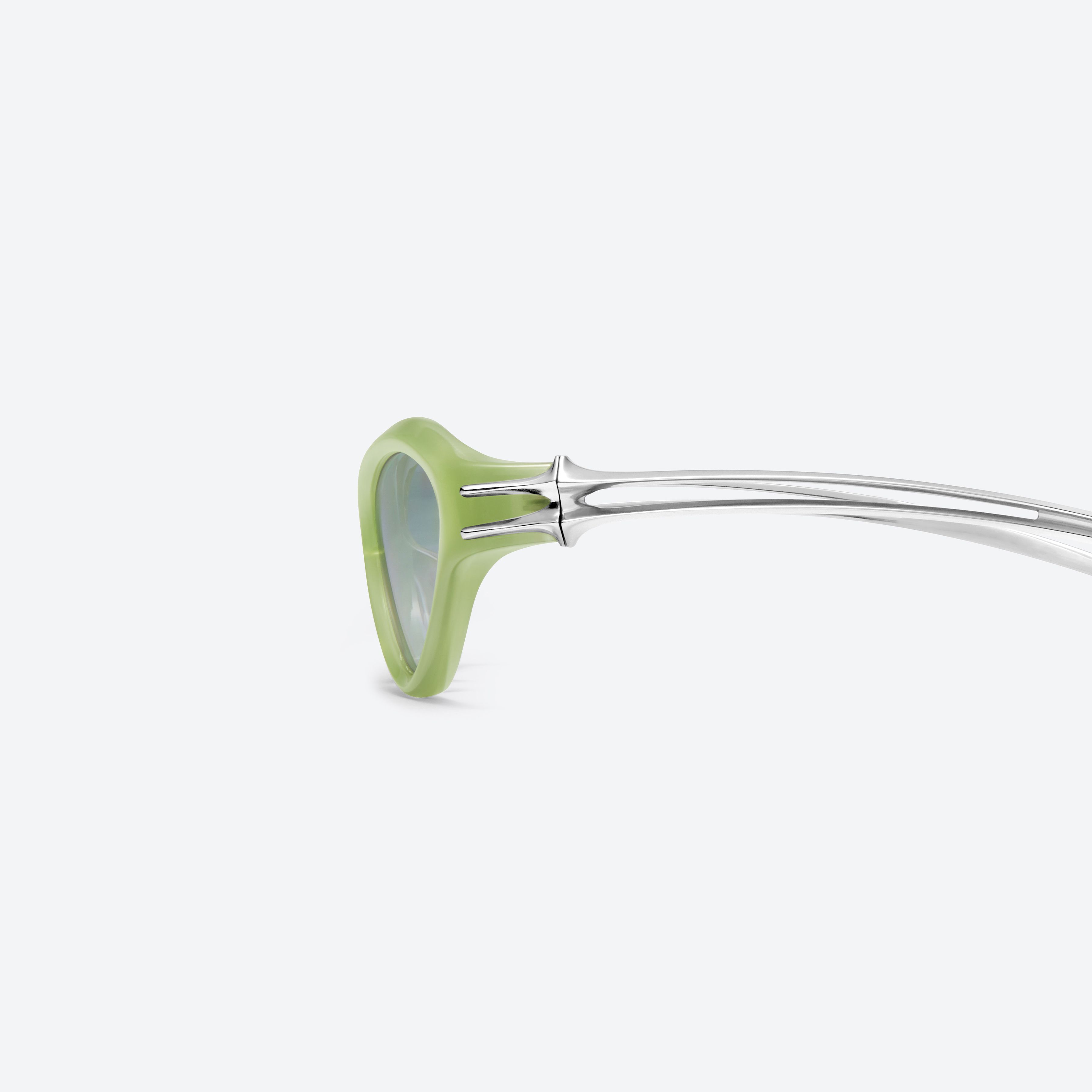 A detailed left view of Gentle Monster Sequence GRC6 Green Mixed framed Wraparound sunglasses.
