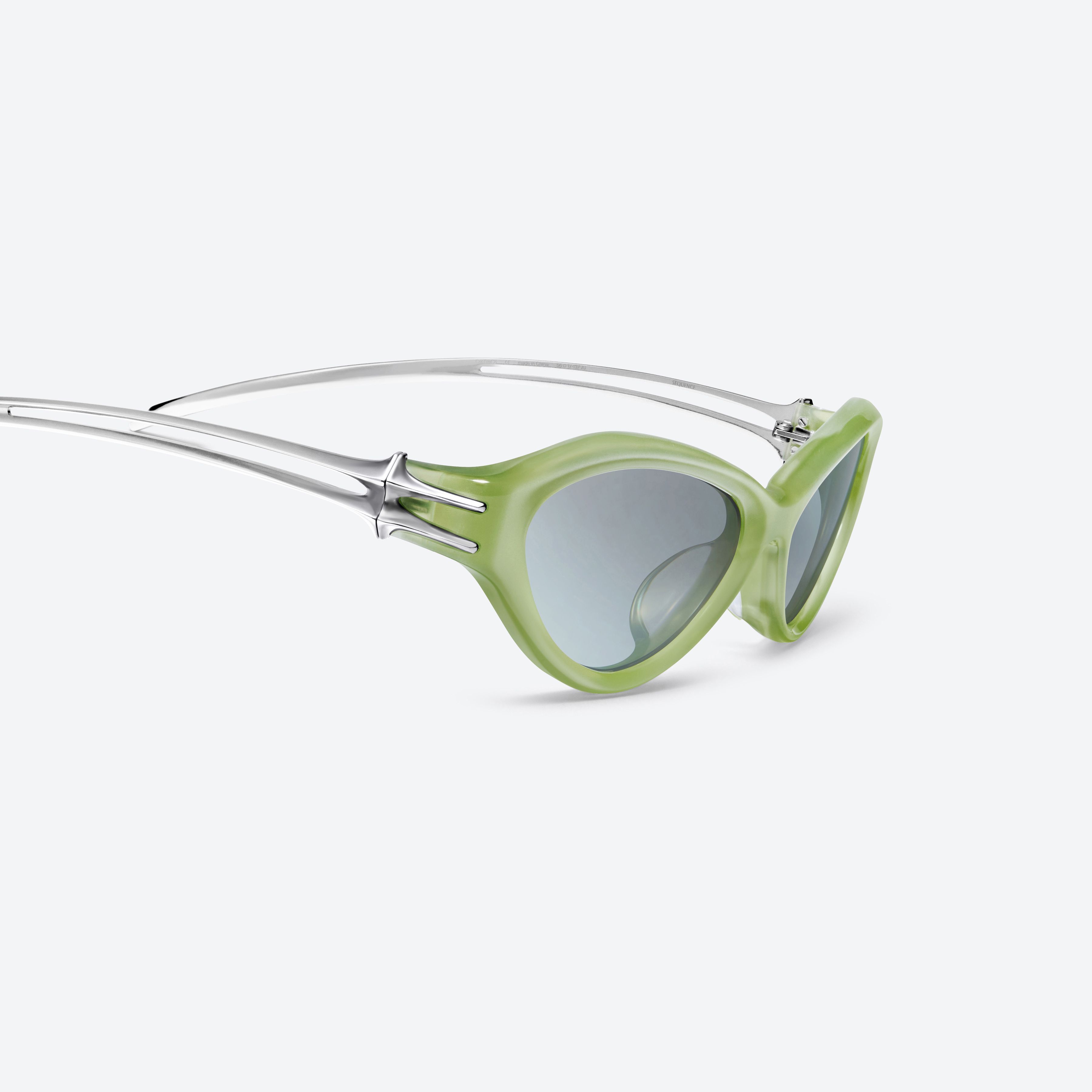 45-degree detailed view of Gentle Monster Sequence GRC6 Green Mixed framed Wraparound sunglasses.