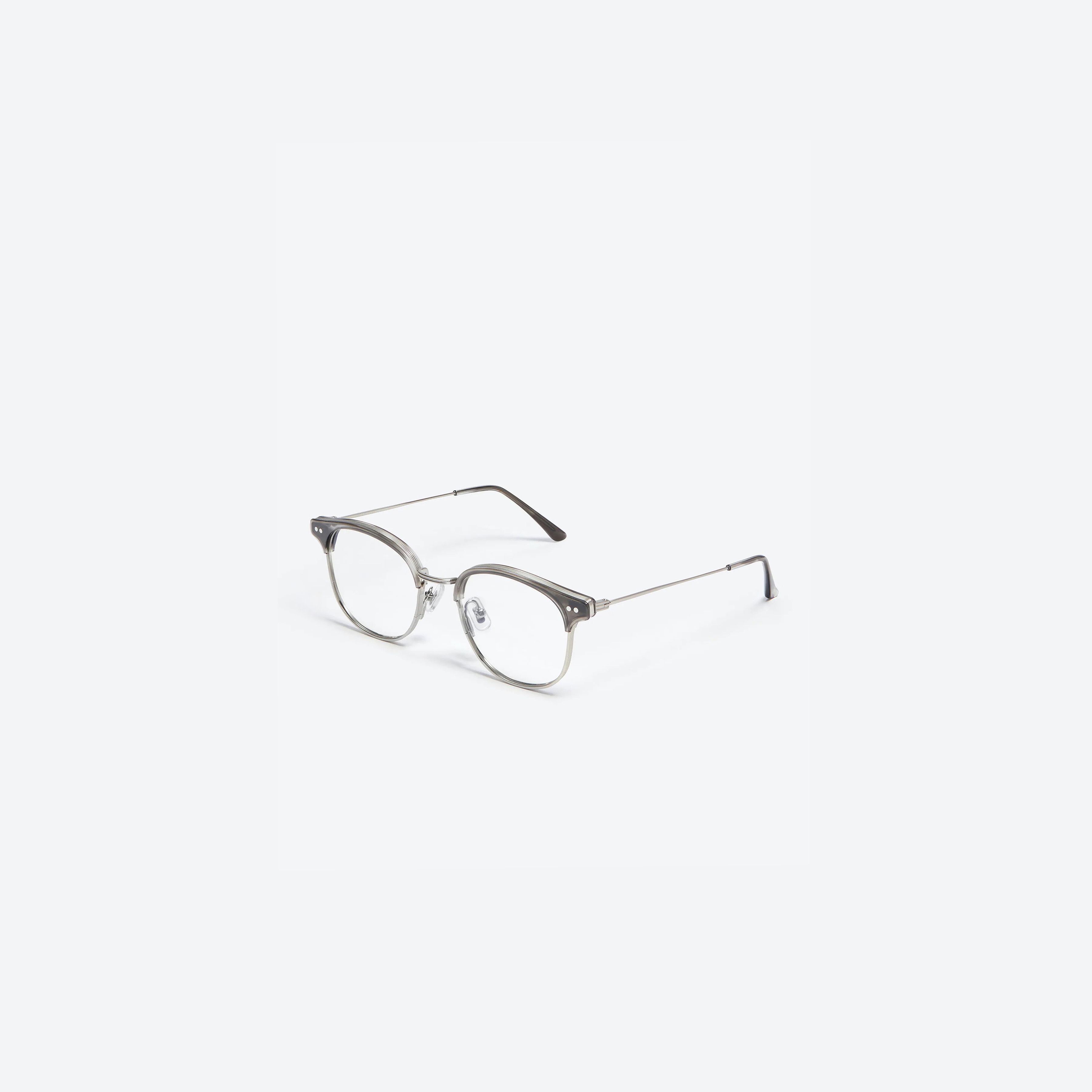 45-degree view of Gentle Monster Alio GD1 Gray Mixed framed Square glasses.