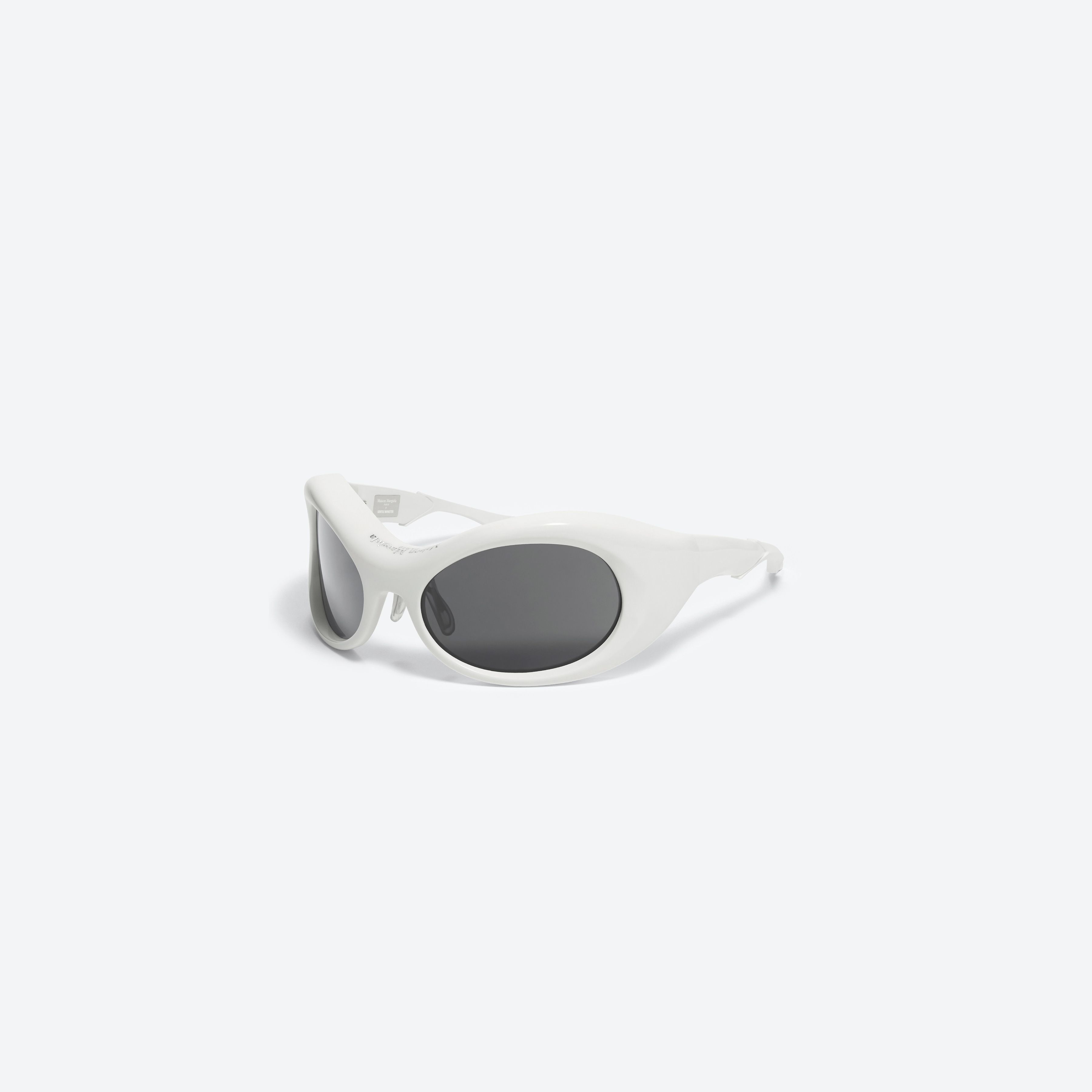 45-degree view of Gentle Monster Maison Margiela - MM001 W2 Similar White Acetate framed Wraparound sunglasses.