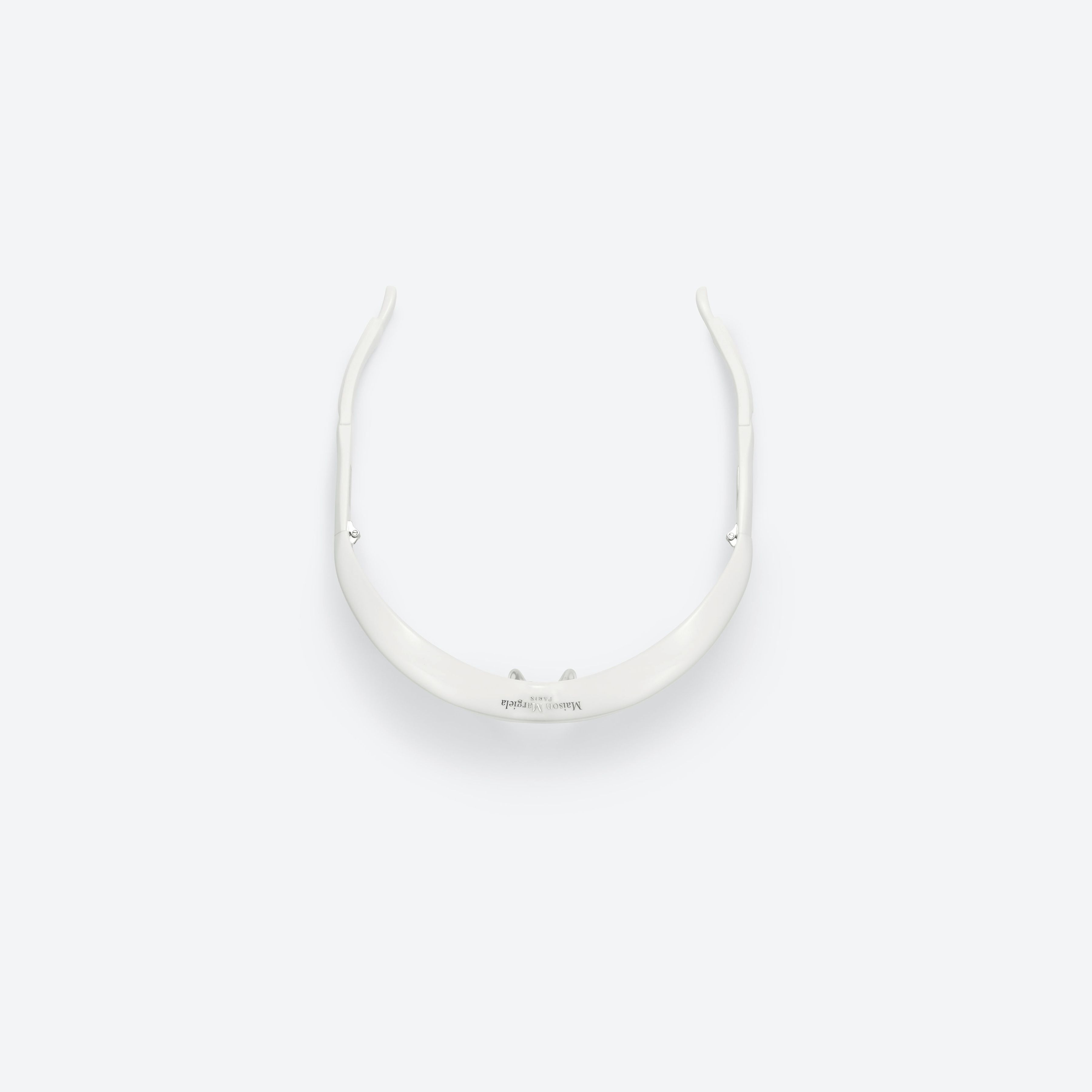 A detailed left view of Gentle Monster Maison Margiela - MM001 W2 Similar White Acetate framed Wraparound sunglasses.
