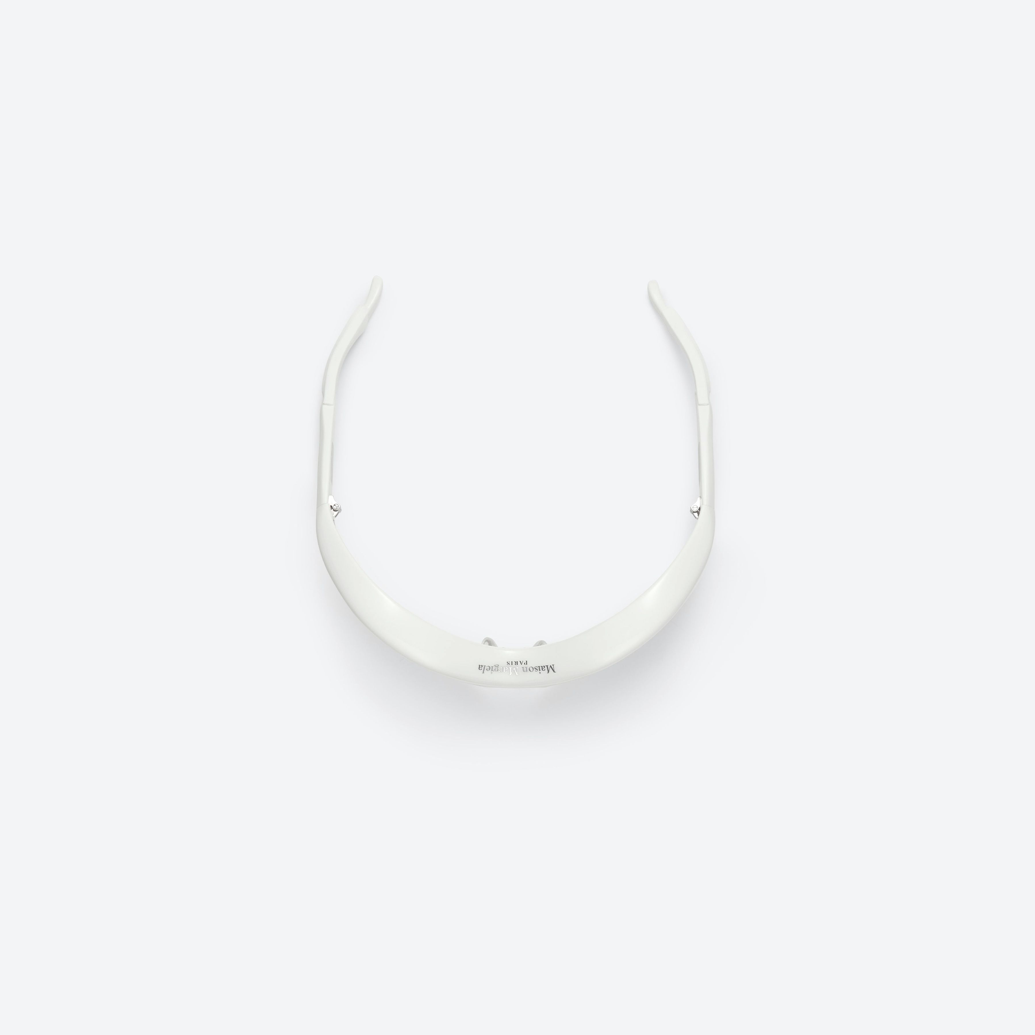A detailed left view of Gentle Monster Maison Margiela - MM001 W2(1M) White Acetate framed Wraparound sunglasses.