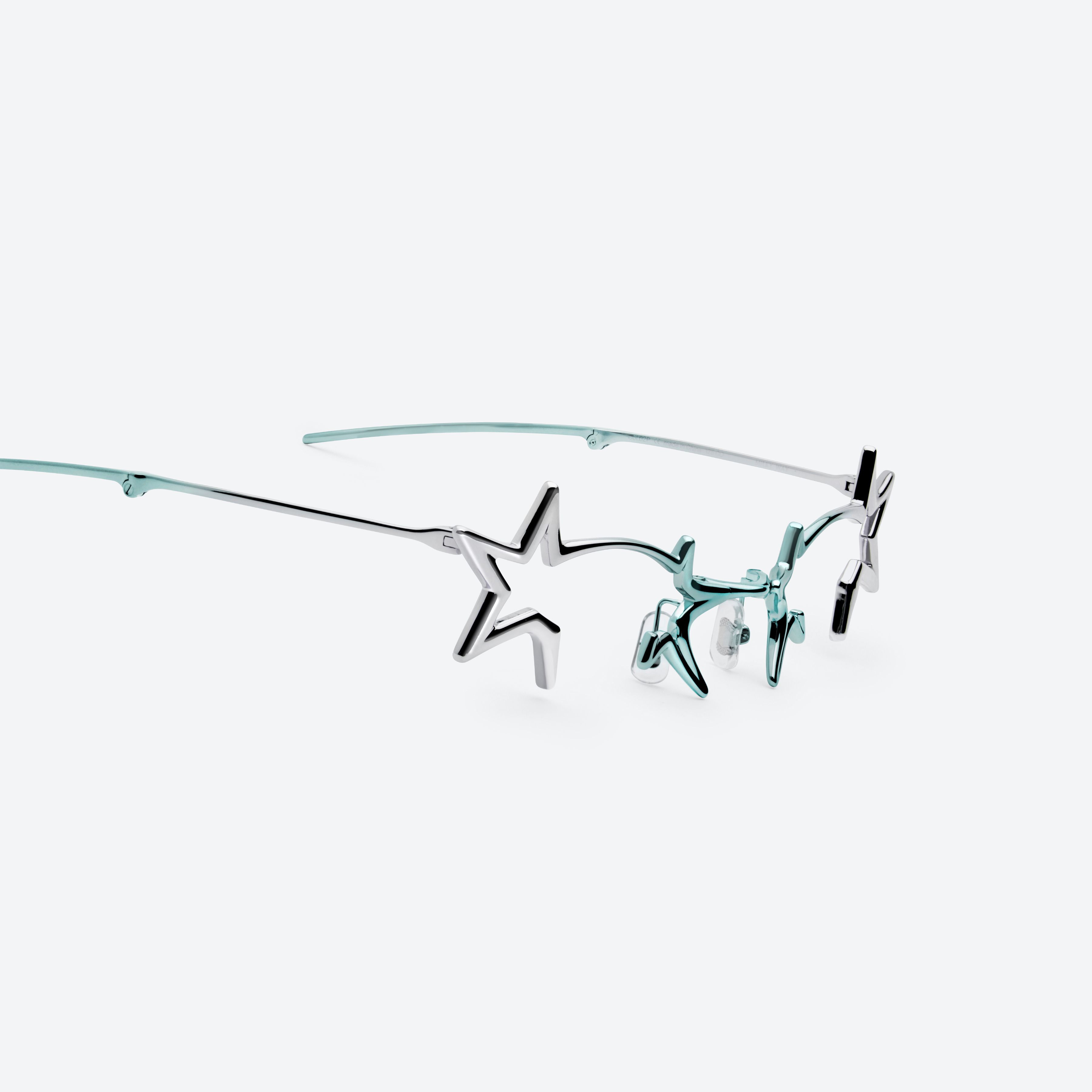 45-degree detailed view of Gentle Monster Milky Way 02BL Similar Silver Metal framed Cat-eye glasses.