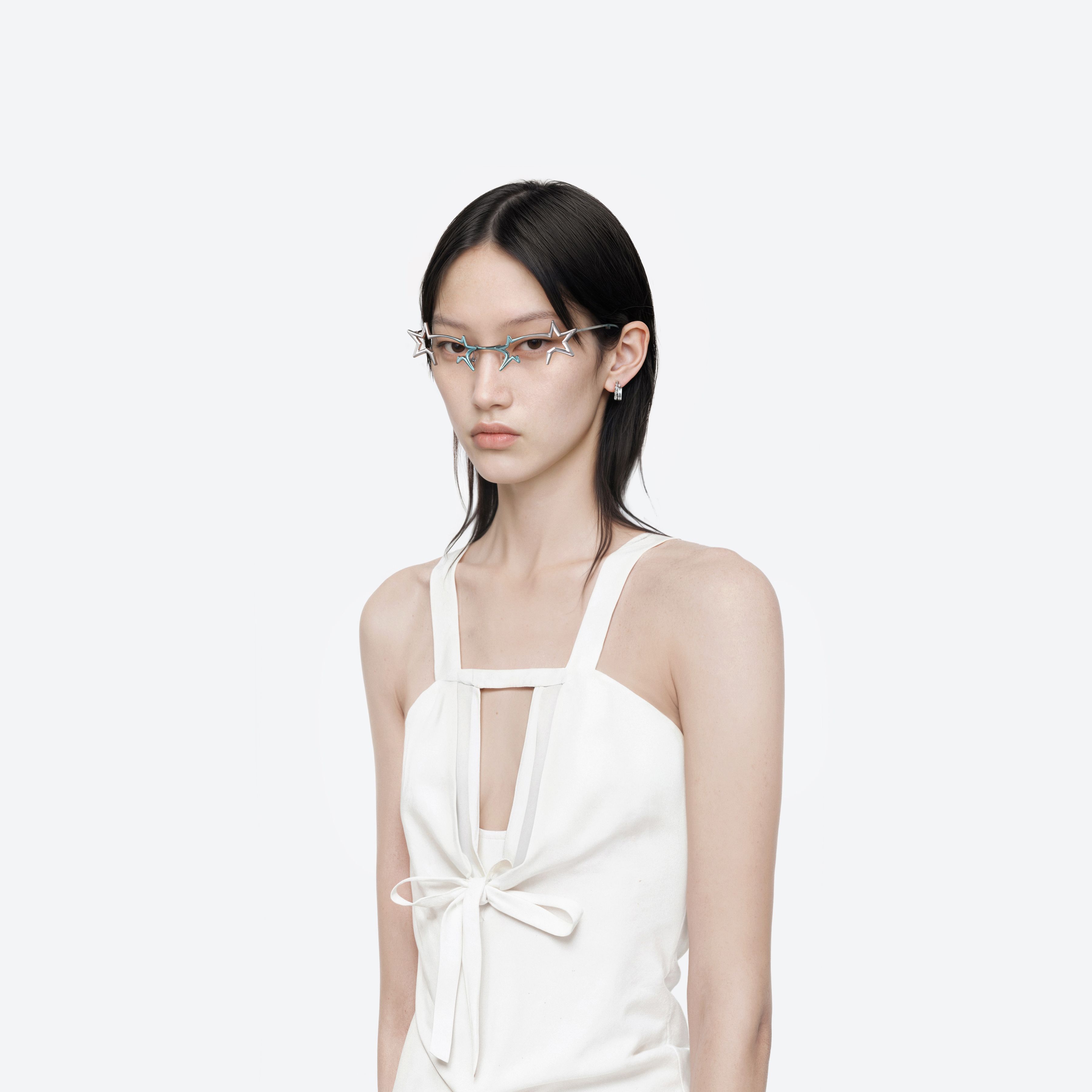 Model wearing the Milky Way 02BL Similar Silver Metal framed Cat-eye glasses.