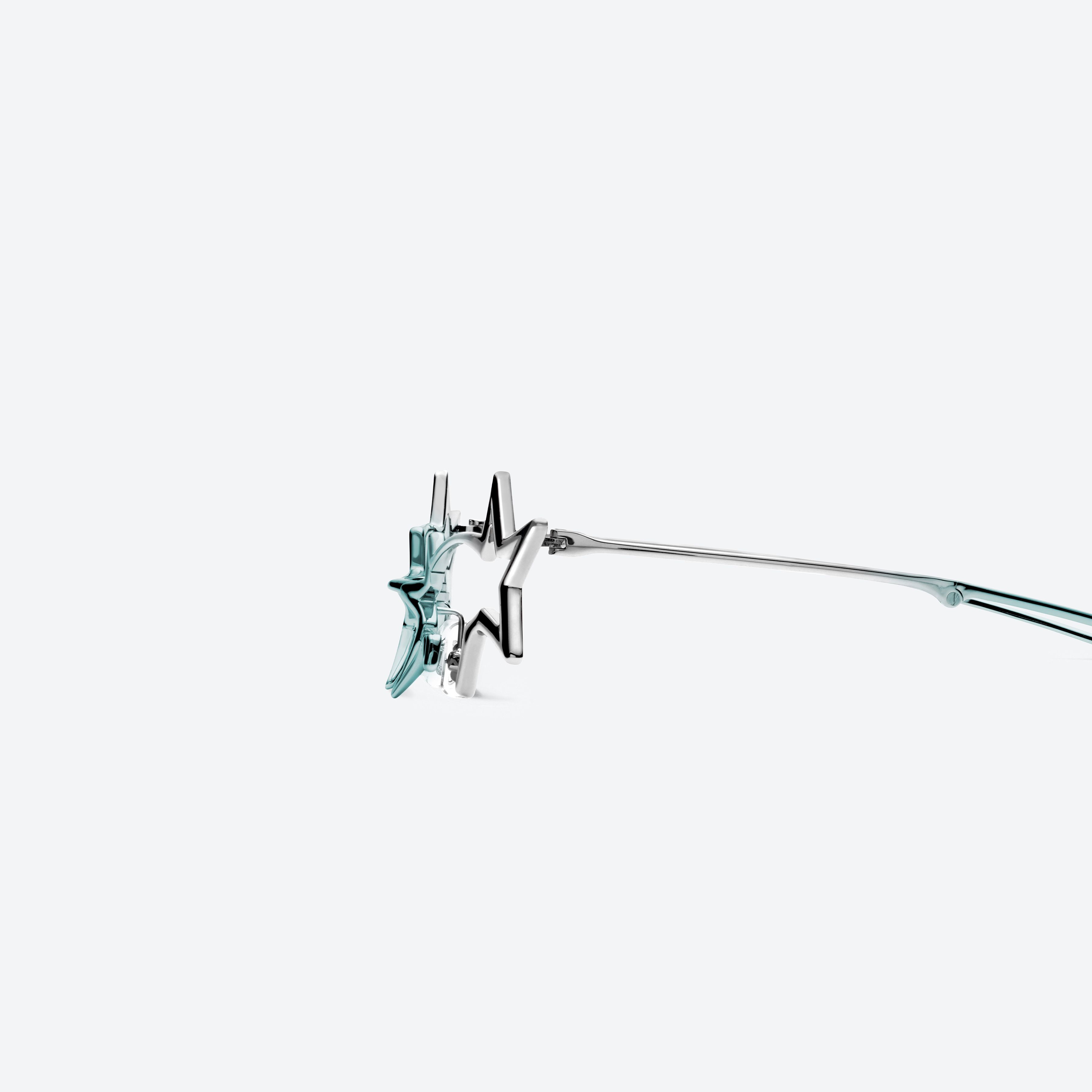 A detailed left view of Gentle Monster Milky Way 02BL Similar Silver Metal framed Cat-eye glasses.