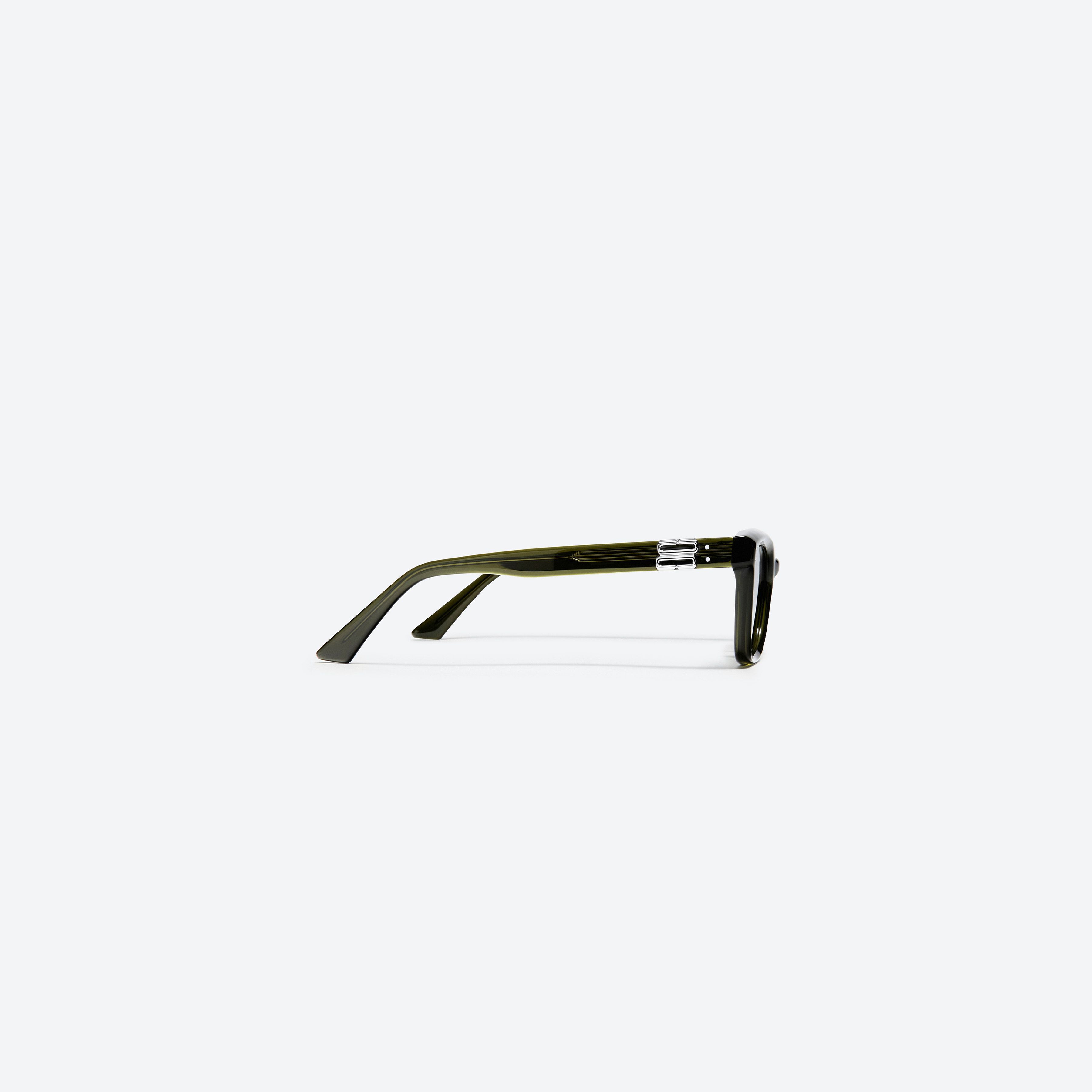 A detailed right view of Gentle Monster Musee KC2 Green Acetate framed Square sunglasses.