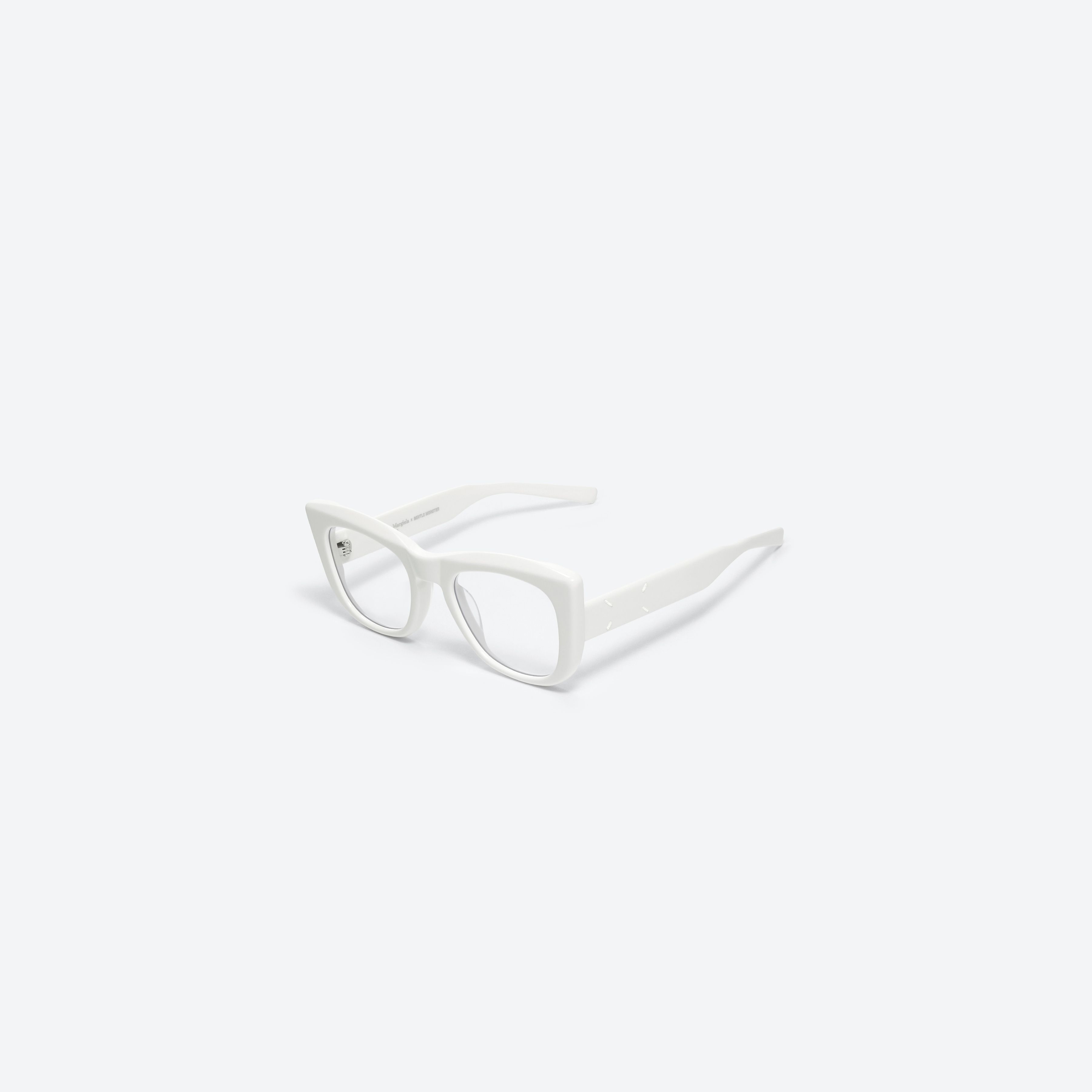 45-degree view of Gentle Monster Maison Margiela - MM008 W2(C) White Acetate framed Cat-eye sunglasses.