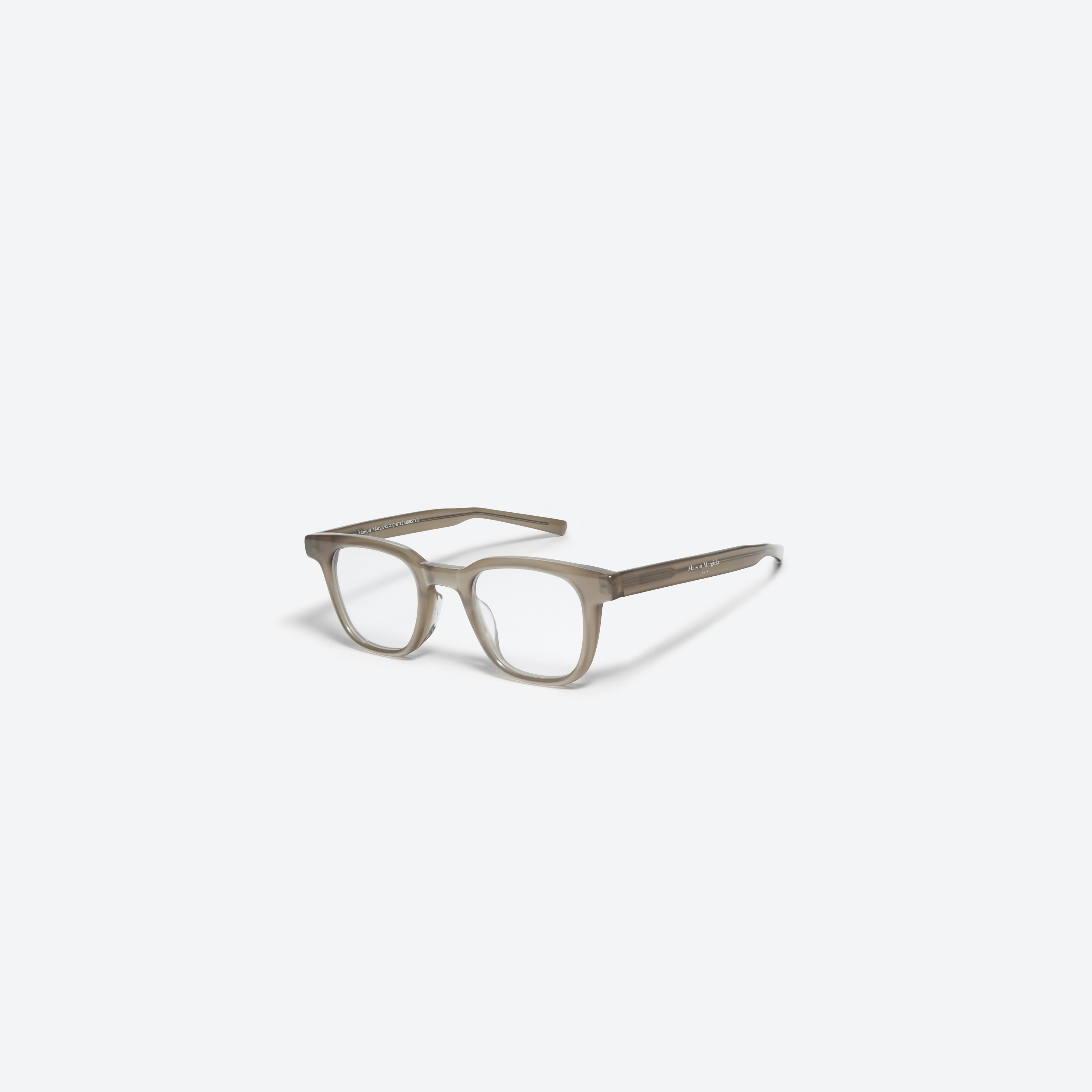 45-degree view of Gentle Monster Maison Margiela - MM010 BRC9 Brown Acetate framed Square glasses.