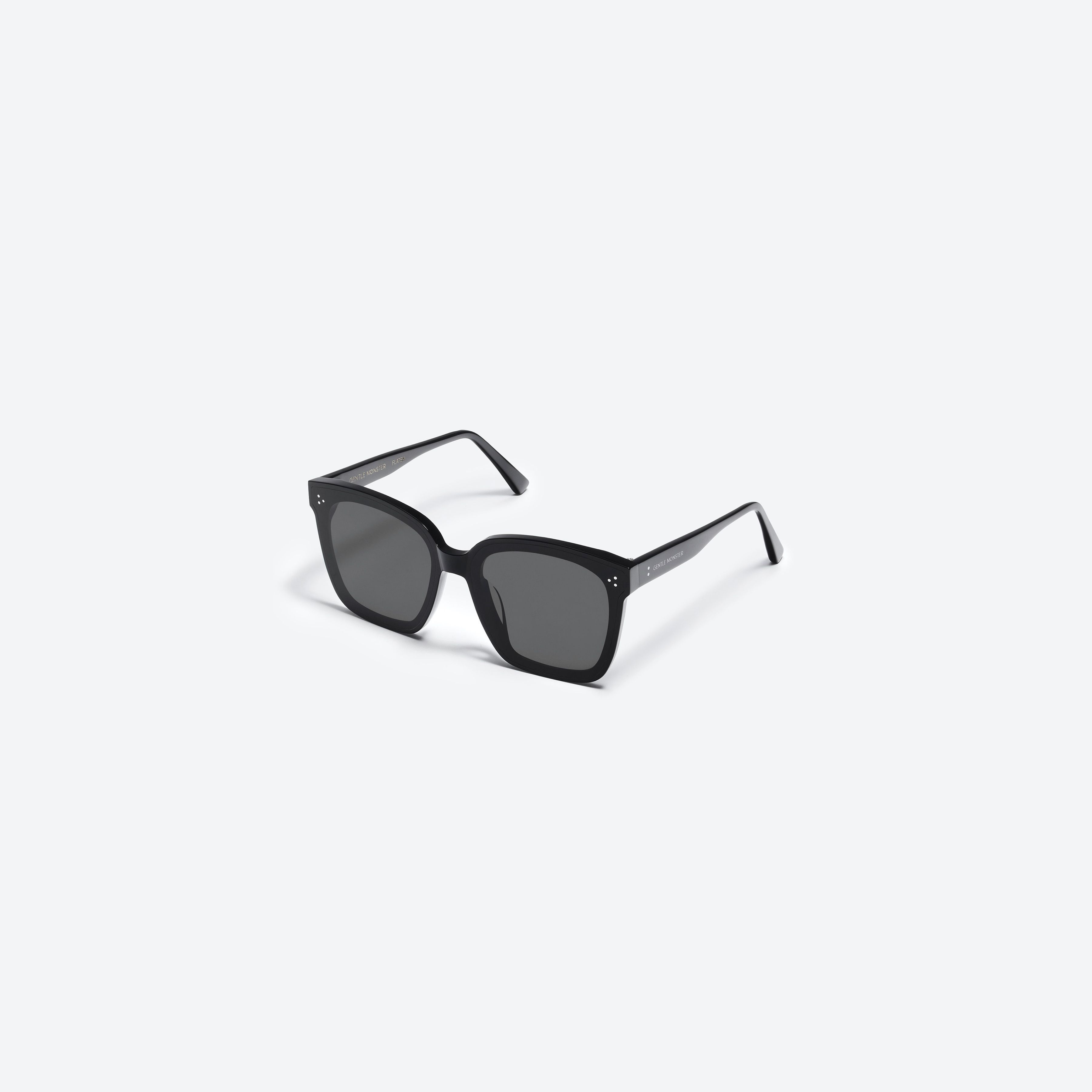 45-degree view of Gentle Monster Dreamer 17 01 Black Acetate framed Square sunglasses.