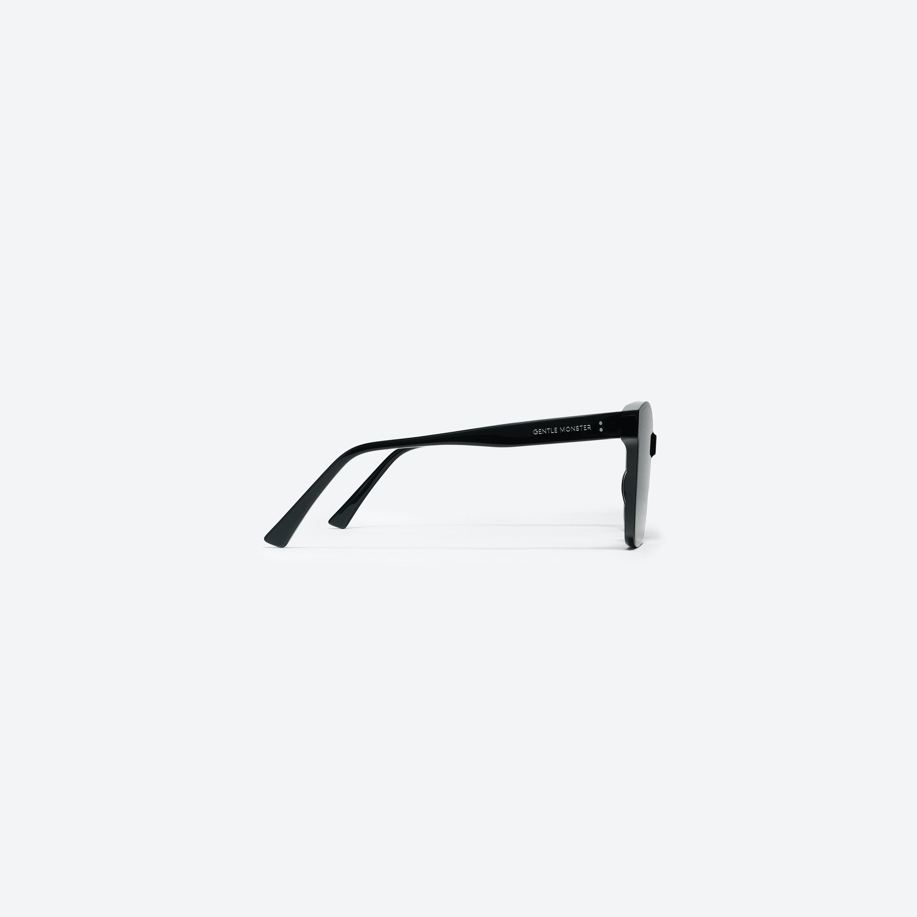 A detailed right view of Gentle Monster Dreamer 17 01 Black Acetate framed Square sunglasses.