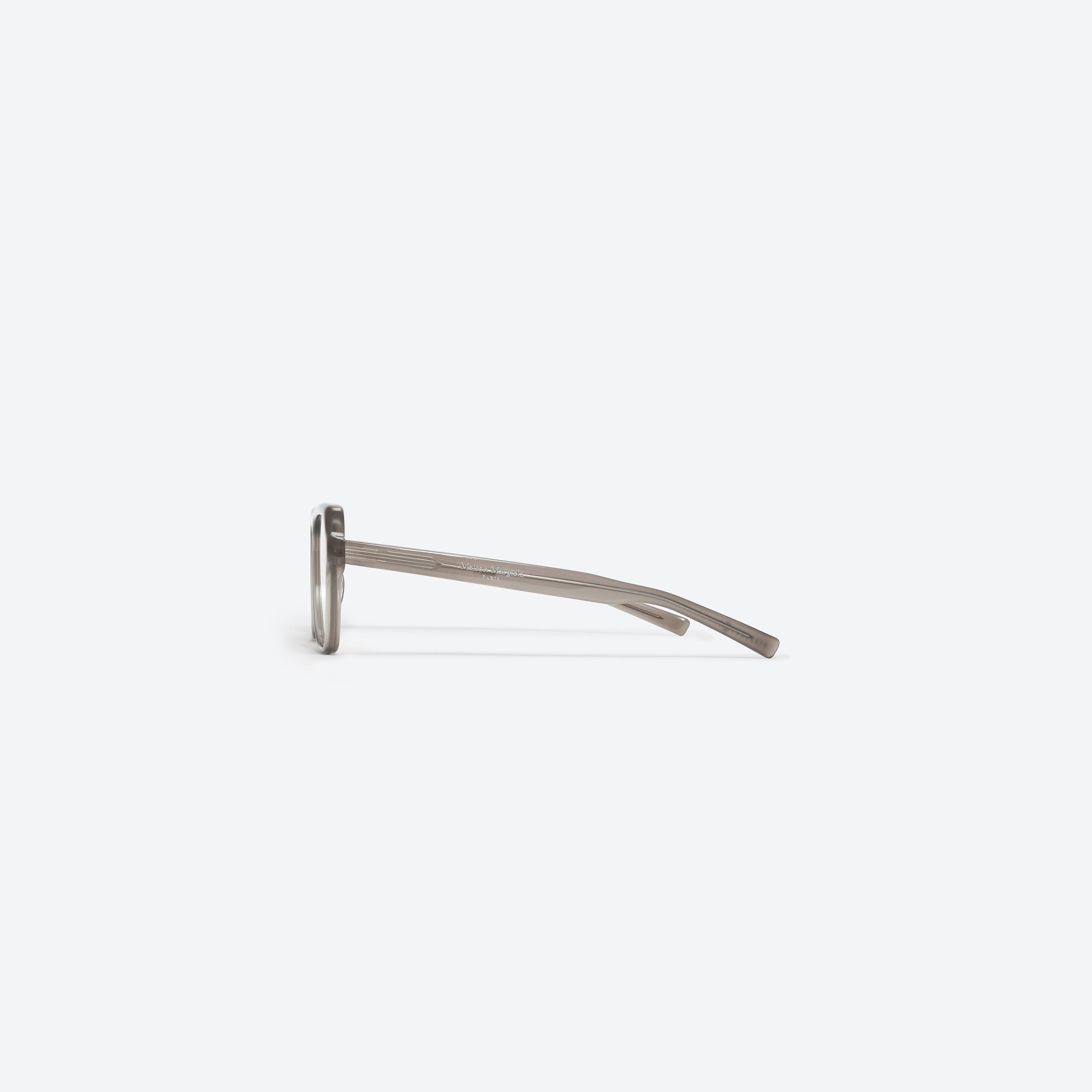 A detailed right view of Gentle Monster Maison Margiela - MM011 BRC9 Brown Acetate framed Aviator glasses.
