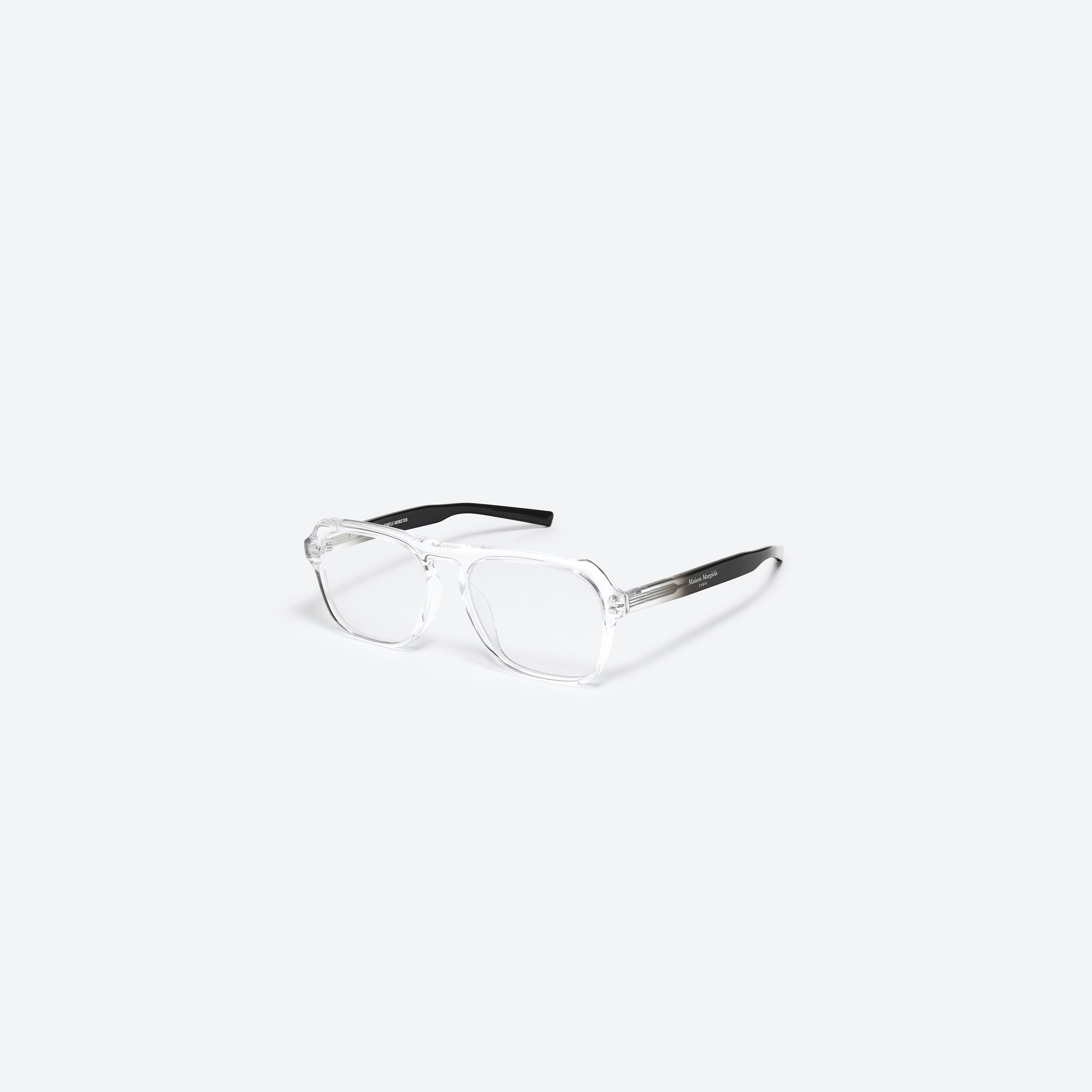 45-degree view of Gentle Monster Maison Margiela - MM011 C1 Clear Acetate framed Aviator glasses.