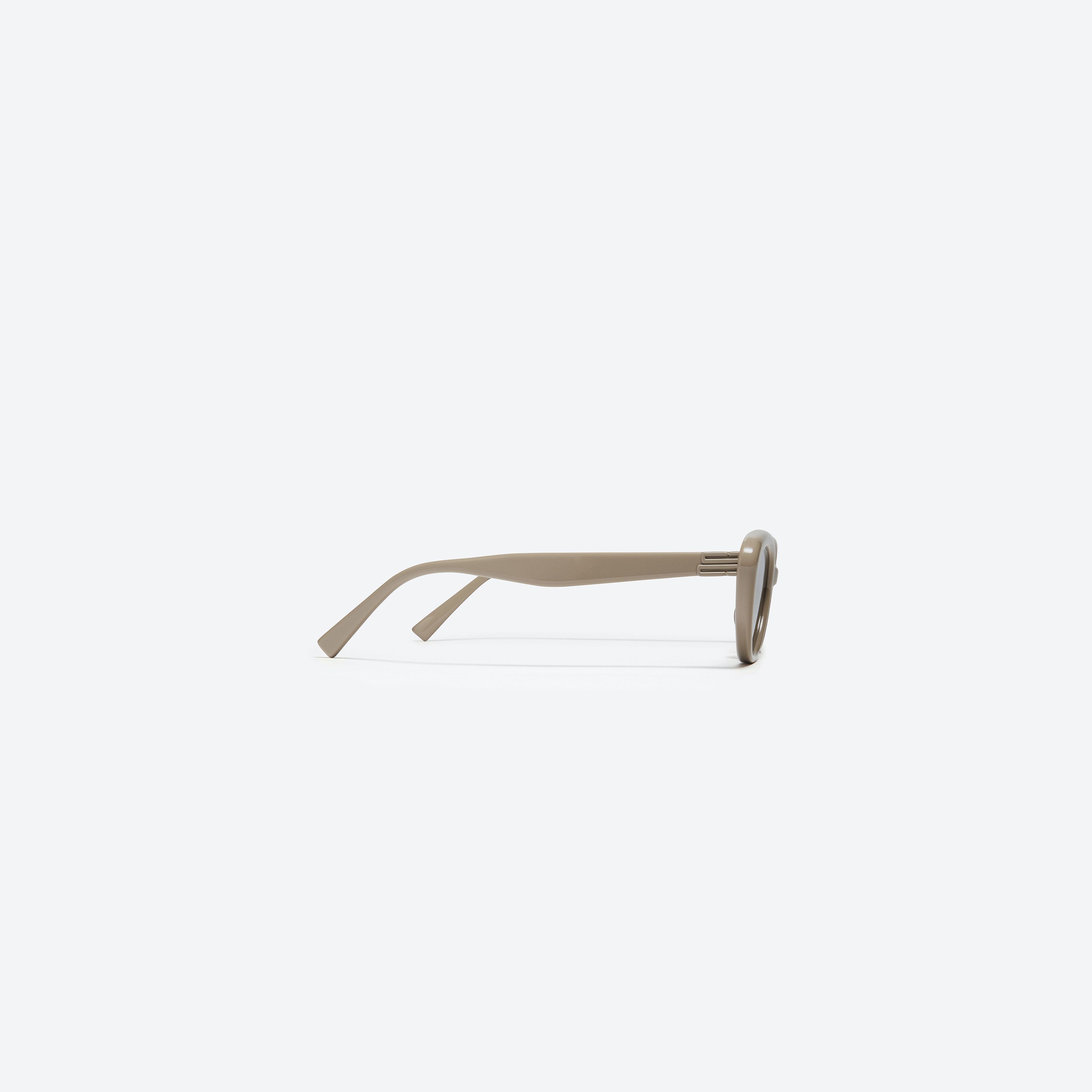 A detailed right view of Gentle Monster Mondri BE1 Brown Acetate framed Cat-eye sunglasses.