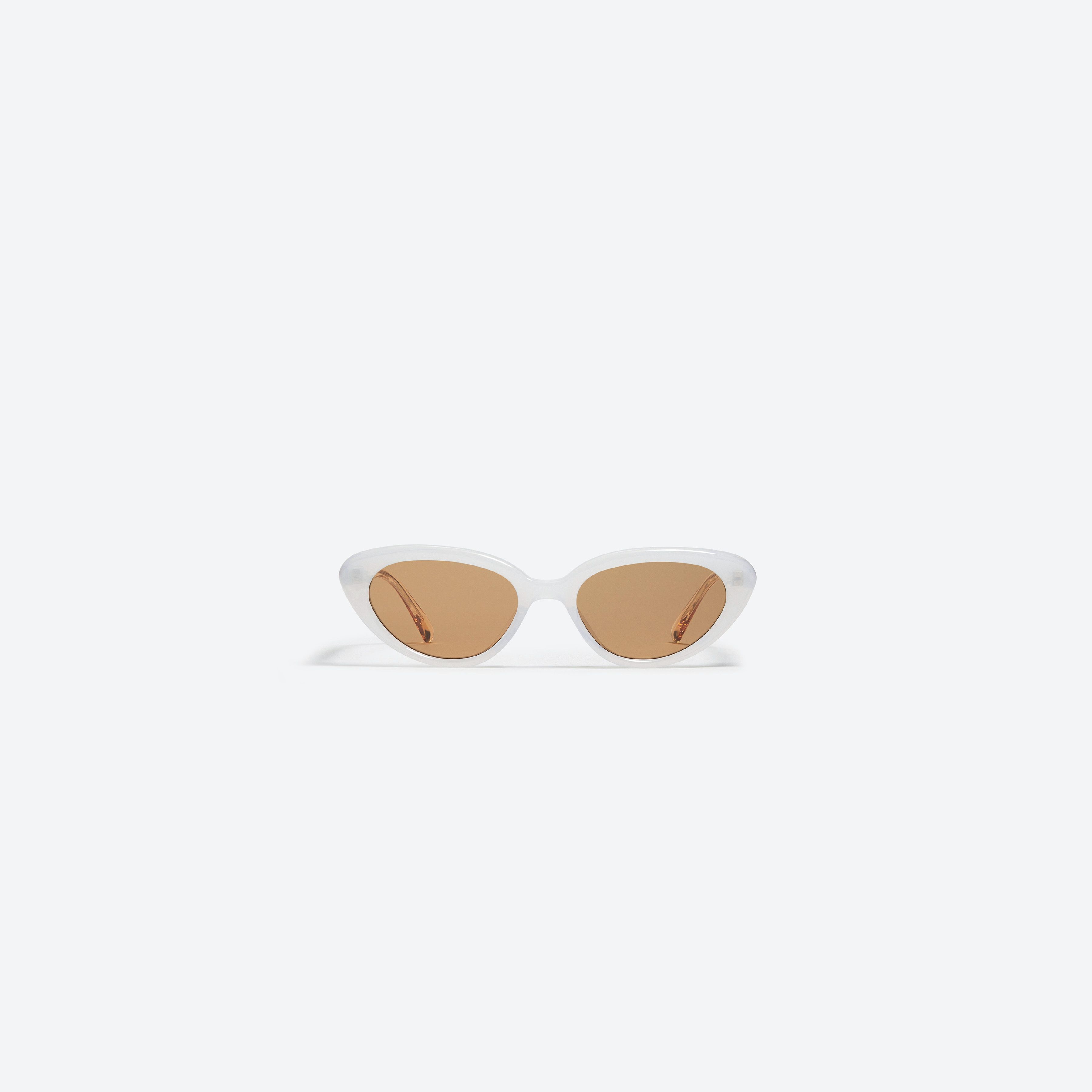 A front view of Gentle Monster Mondri WC5 White Acetate framed Cat-eye sunglasses.