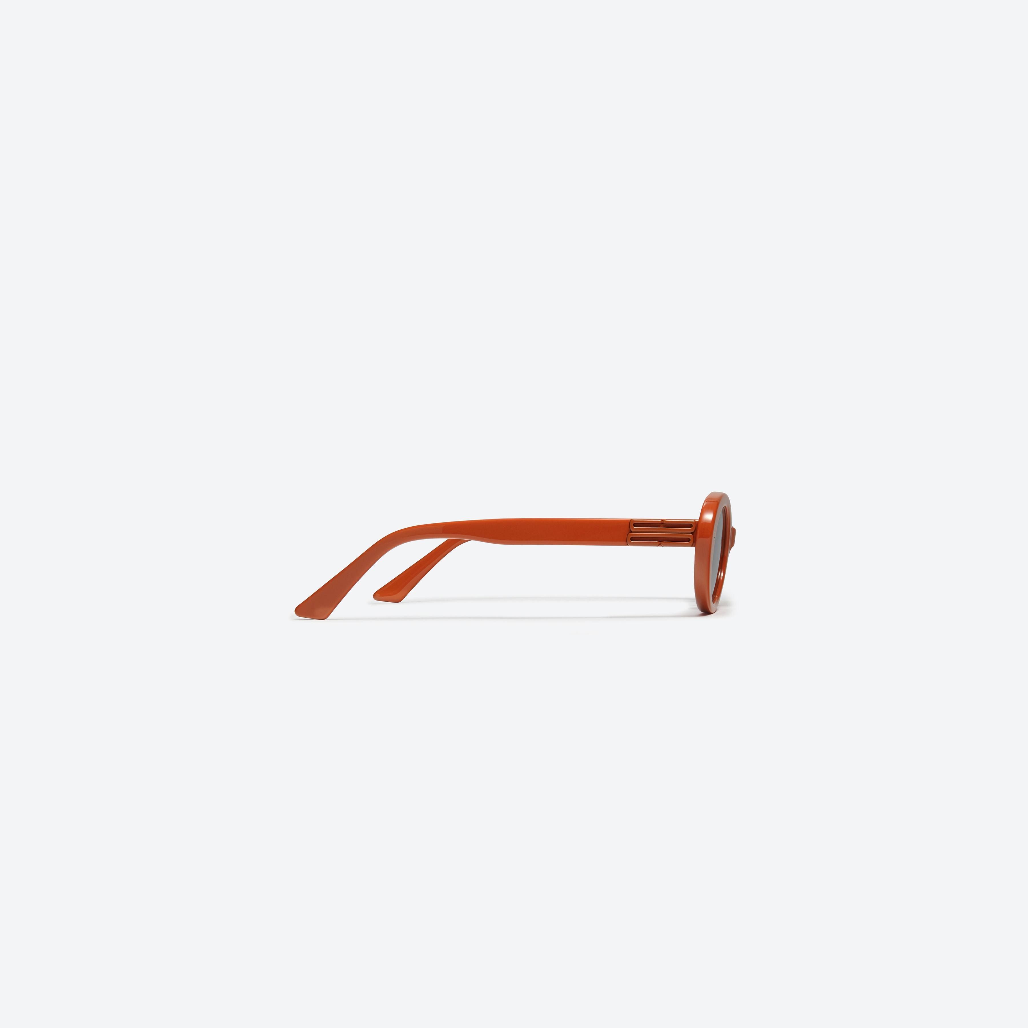 A detailed right view of Gentle Monster Jeans OR2 Orange Acetate framed Oval sunglasses.