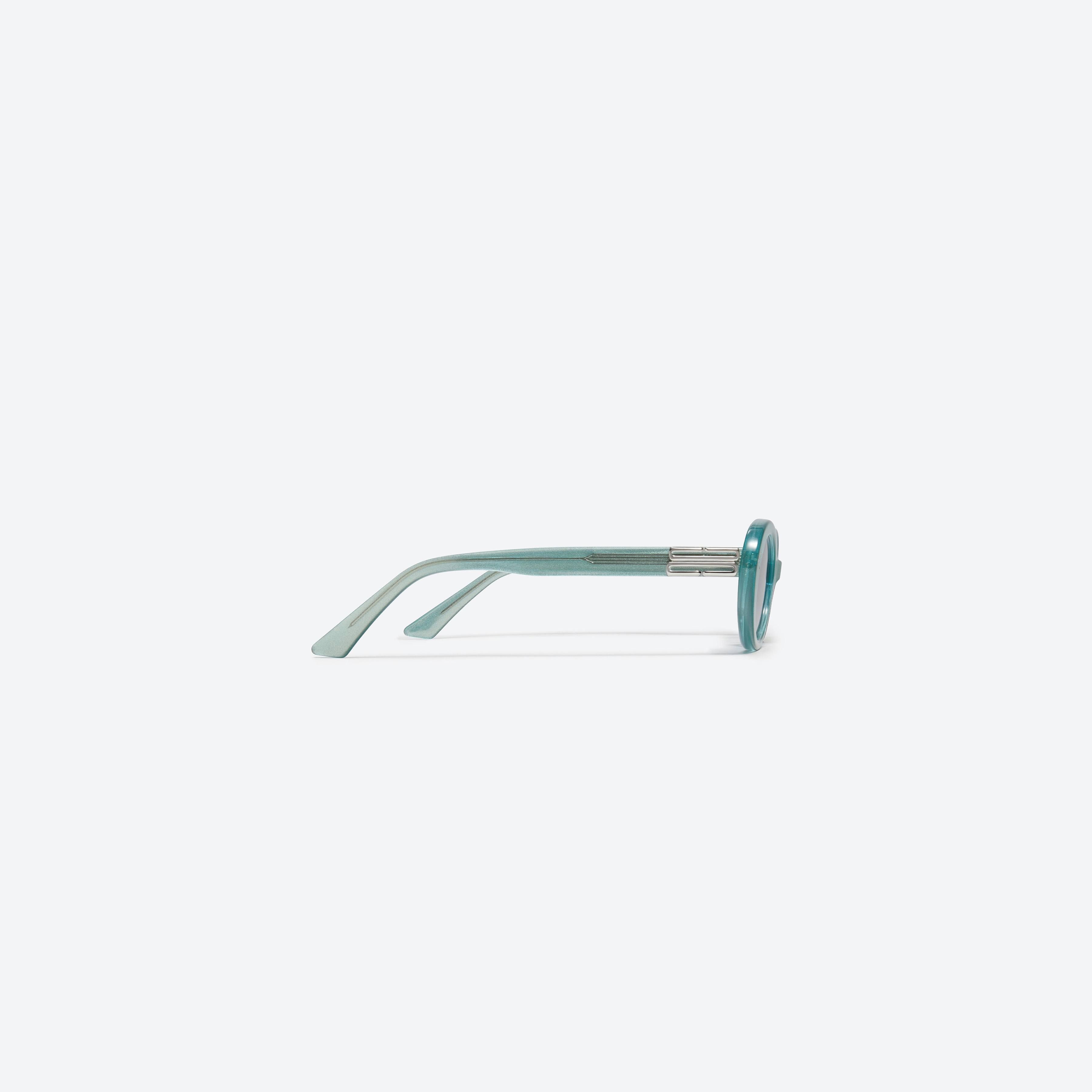 A detailed right view of Gentle Monster Jeans GRC4 Green Acetate framed Oval sunglasses.