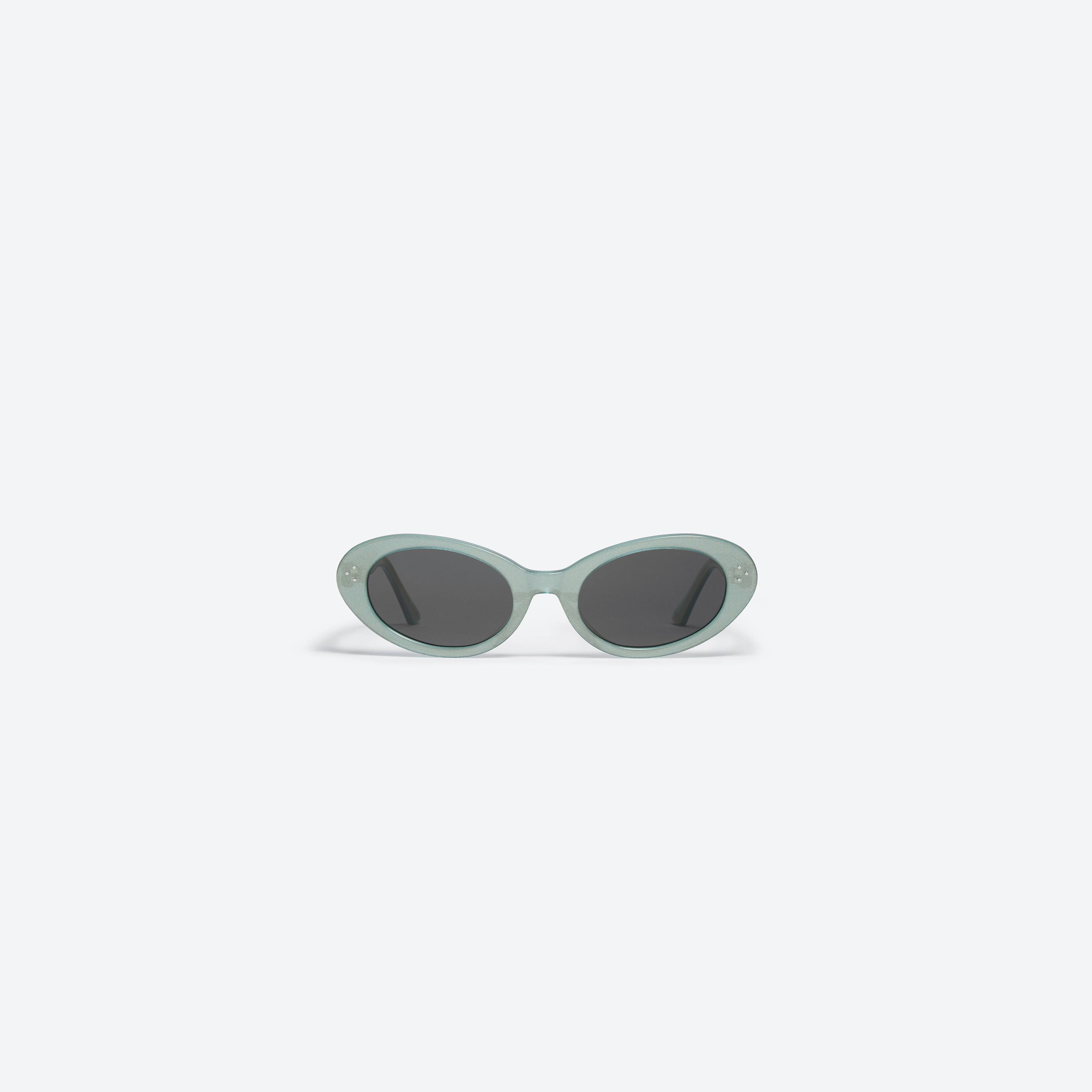 A front view of Gentle Monster Jeans GRC4 Green Acetate framed Oval sunglasses.