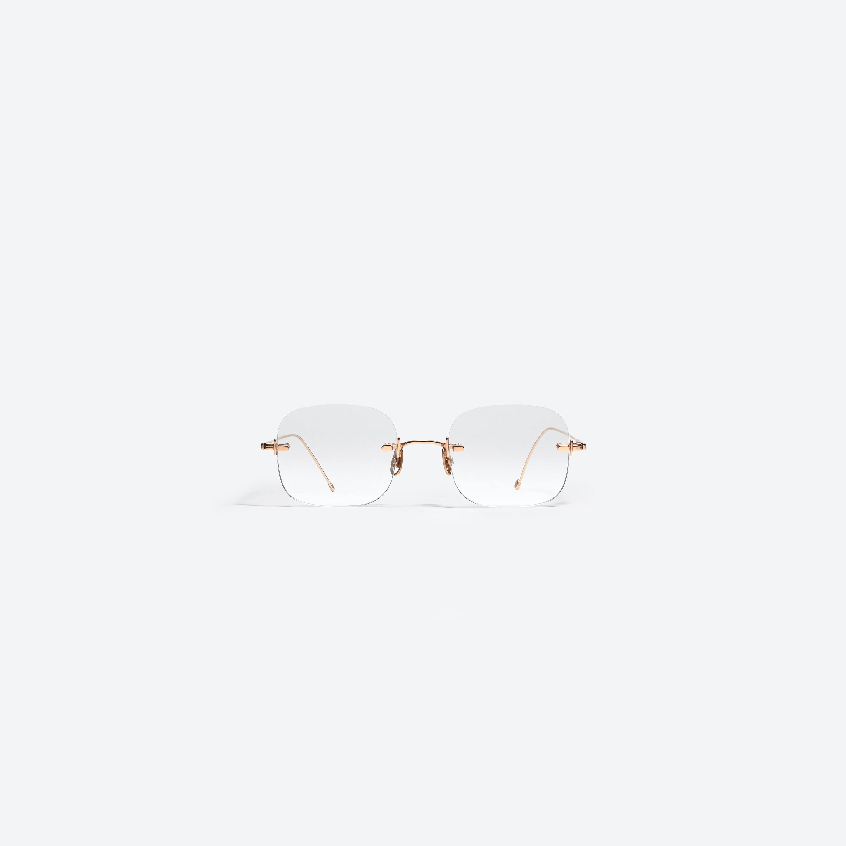 A front view of Gentle Monster Jennie - Daisy 032 Gold Metal framed Square glasses.