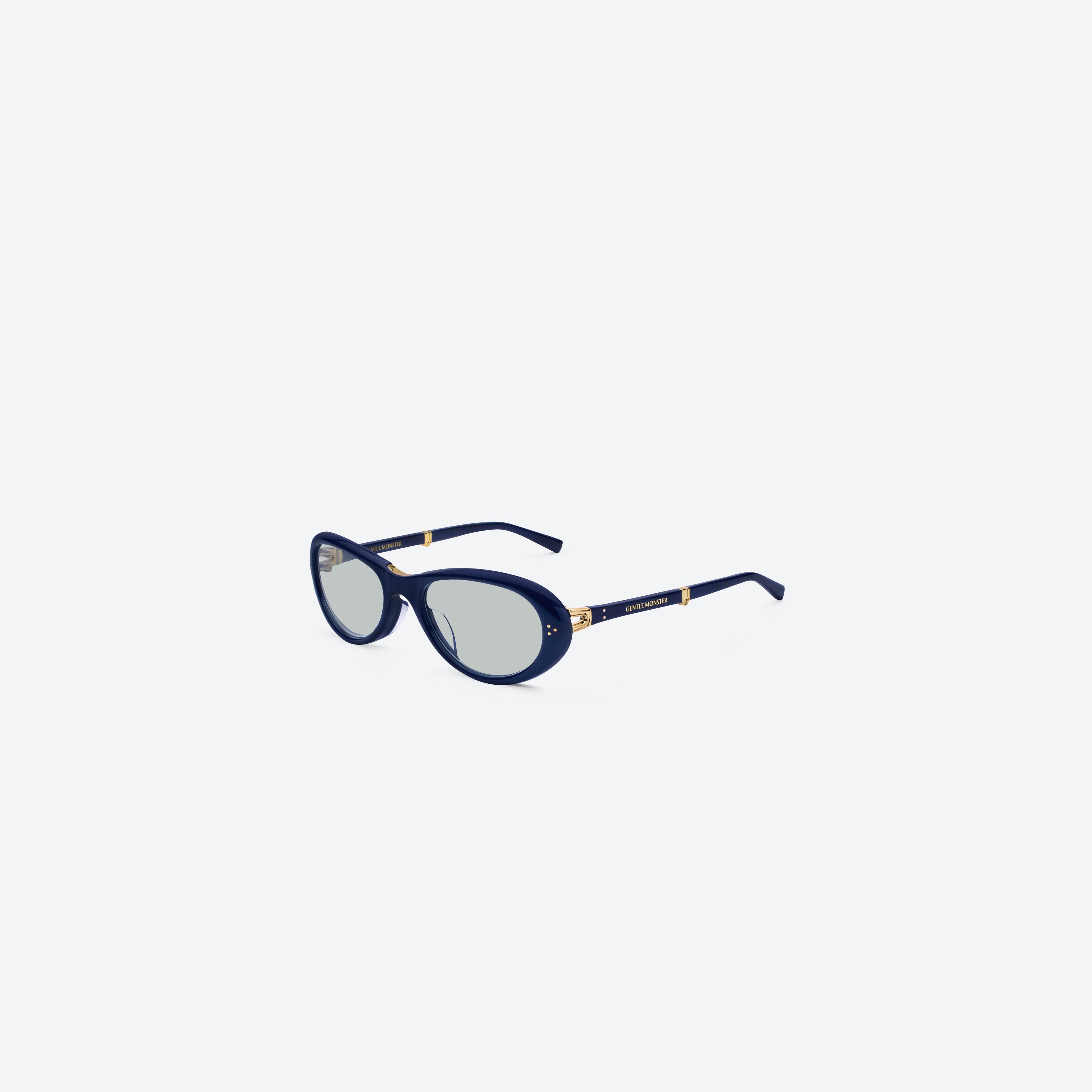 45-degree view of Gentle Monster Orbit N6 Blue Acetate framed Round glasses.