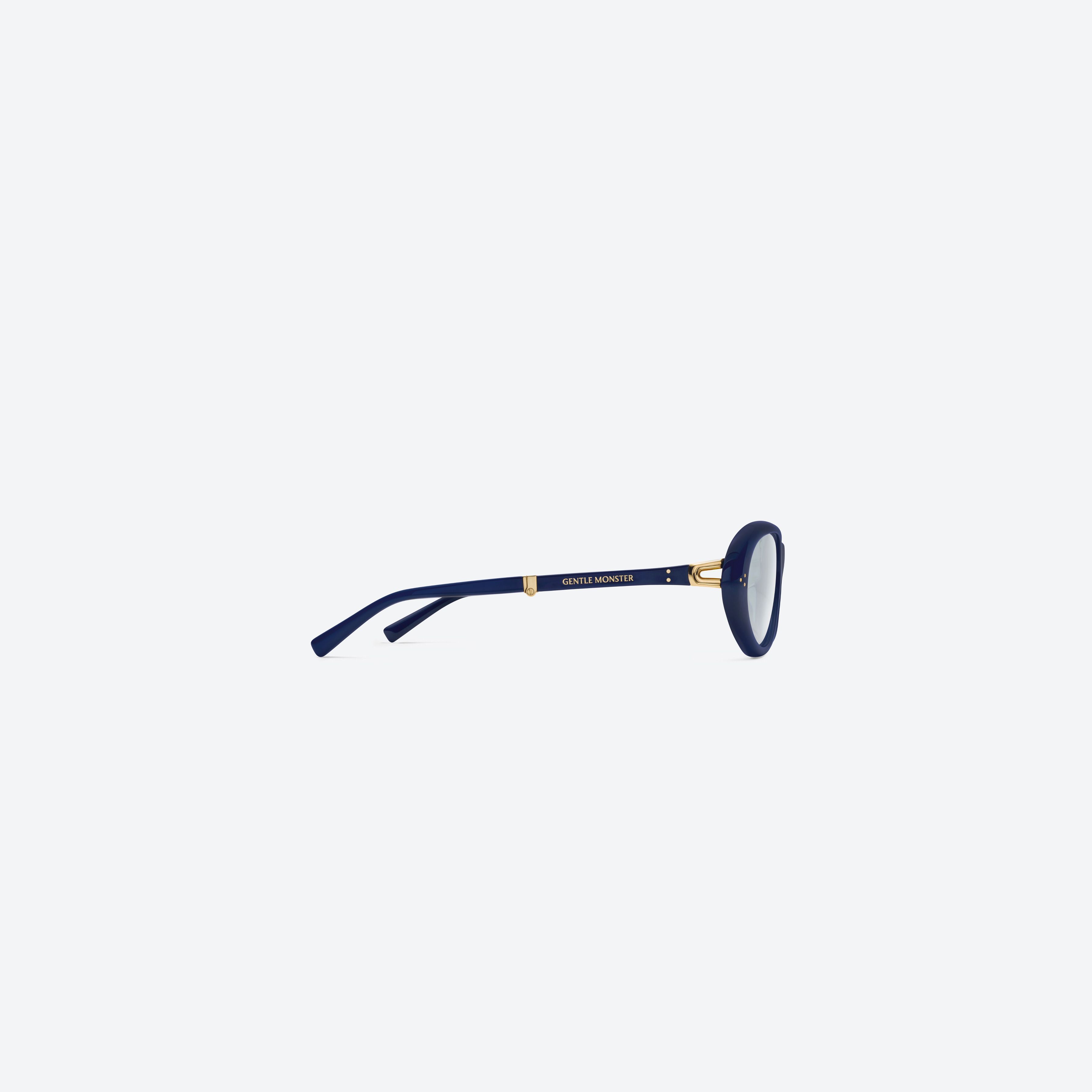 A detailed right view of Gentle Monster Orbit N6 Blue Acetate framed Round glasses.
