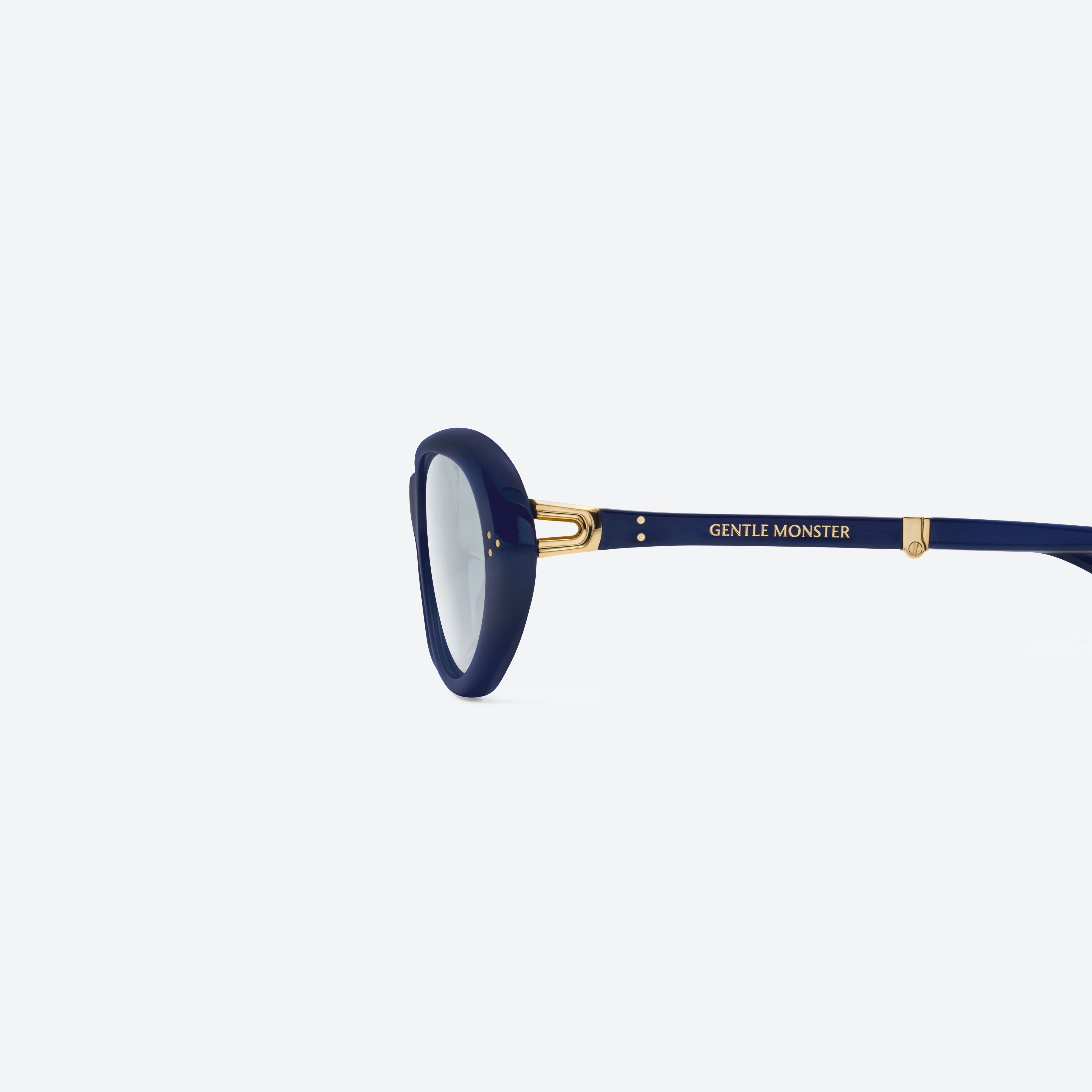 A detailed left view of Gentle Monster Orbit N6 Blue Acetate framed Round glasses.