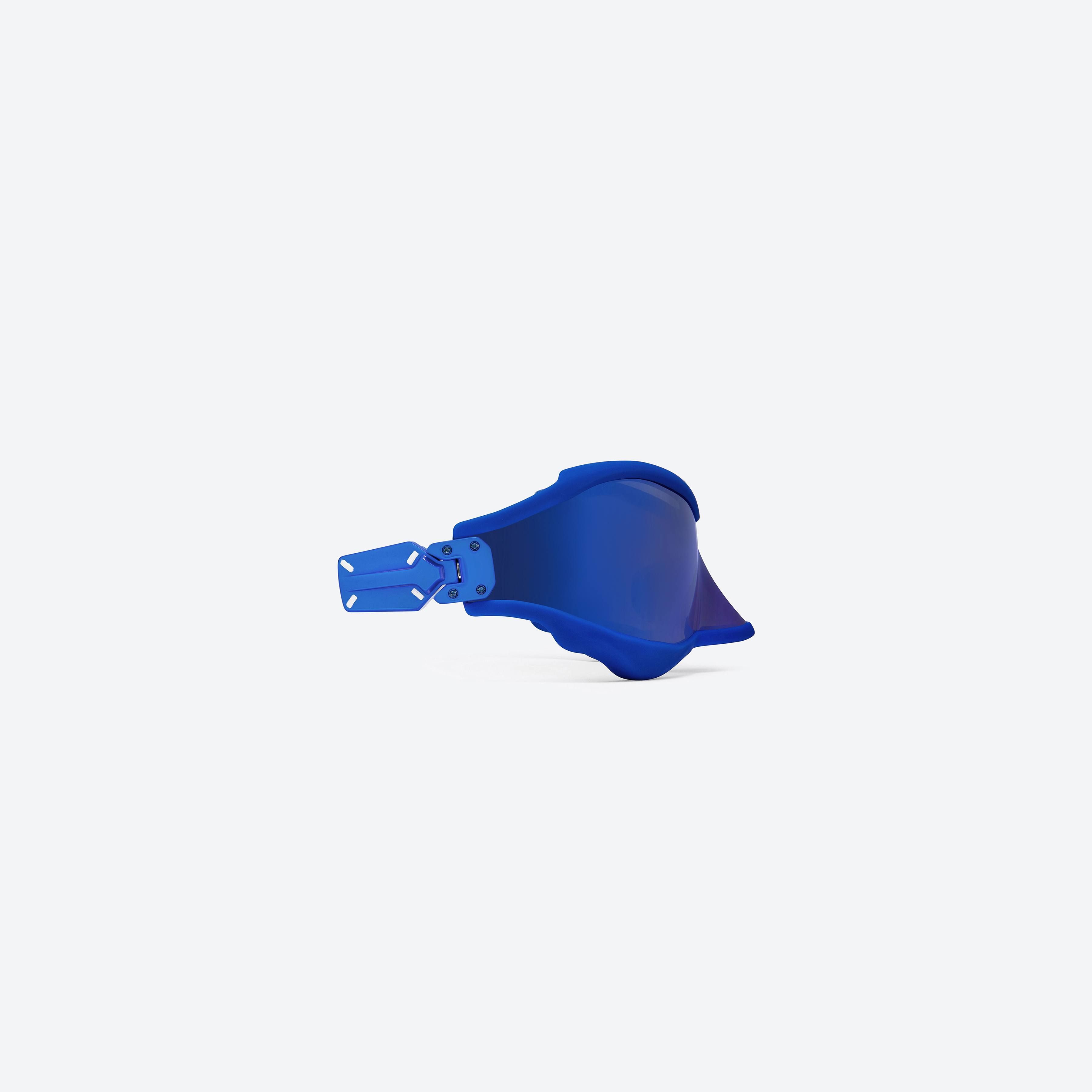 A detailed right view of Gentle Monster Maison Margiela - MM101 BL4 Blue Mixed framed Wraparound sunglasses.