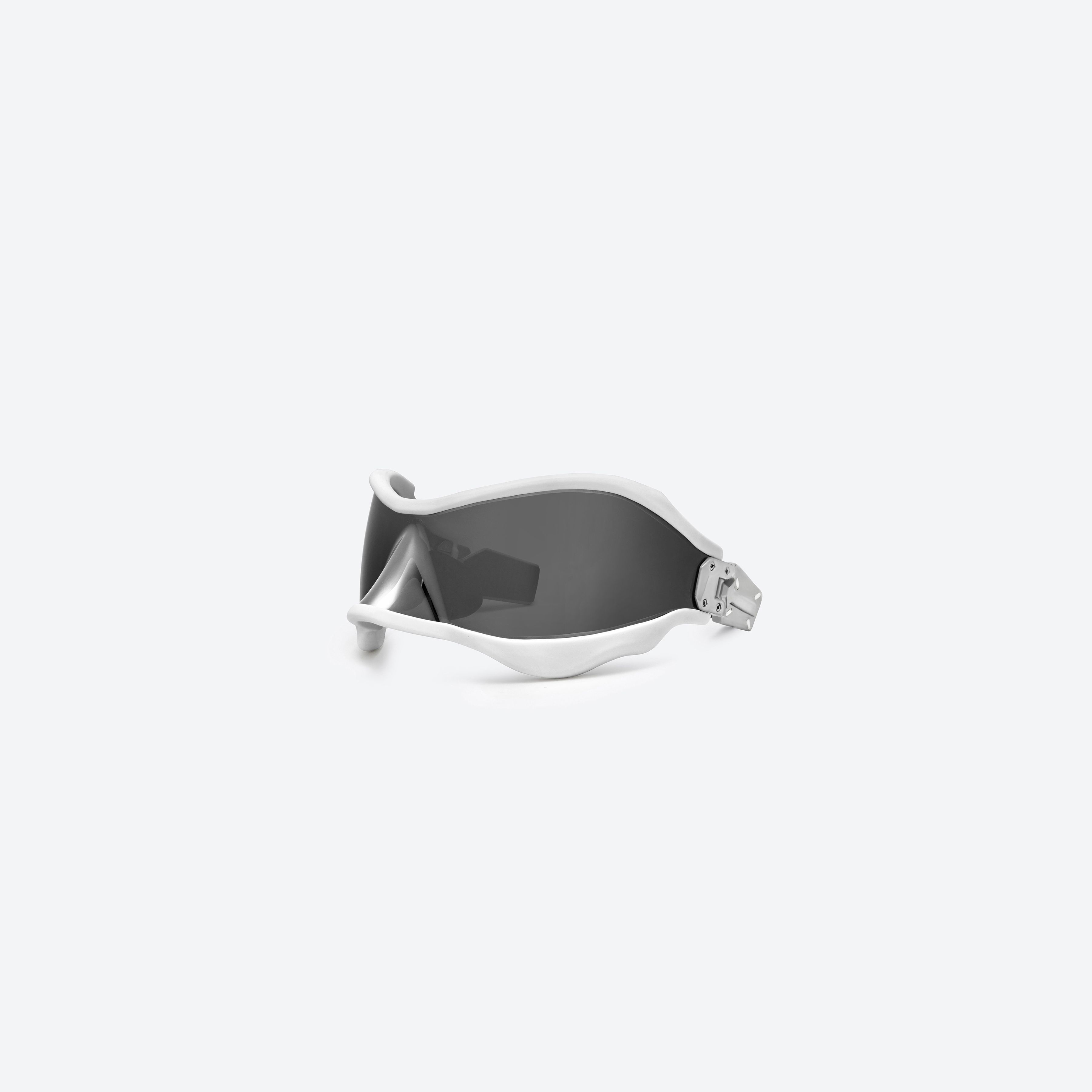 45-degree view of Gentle Monster Maison Margiela - MM101S 02 Small Similar Silver Mixed framed Wraparound sunglasses.