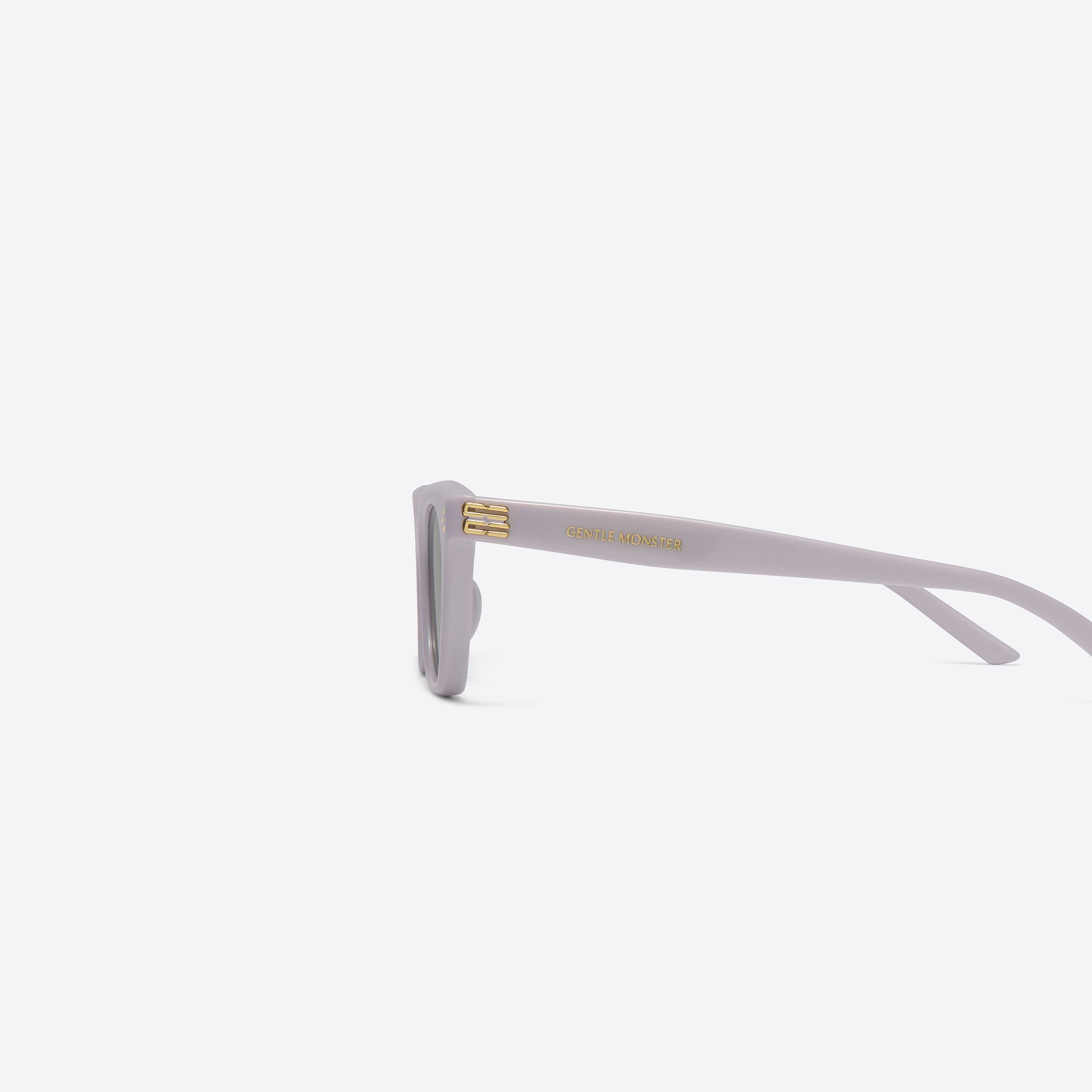 A detailed left view of Gentle Monster GISELE V4 Purple Acetate framed Cat-eye sunglasses.