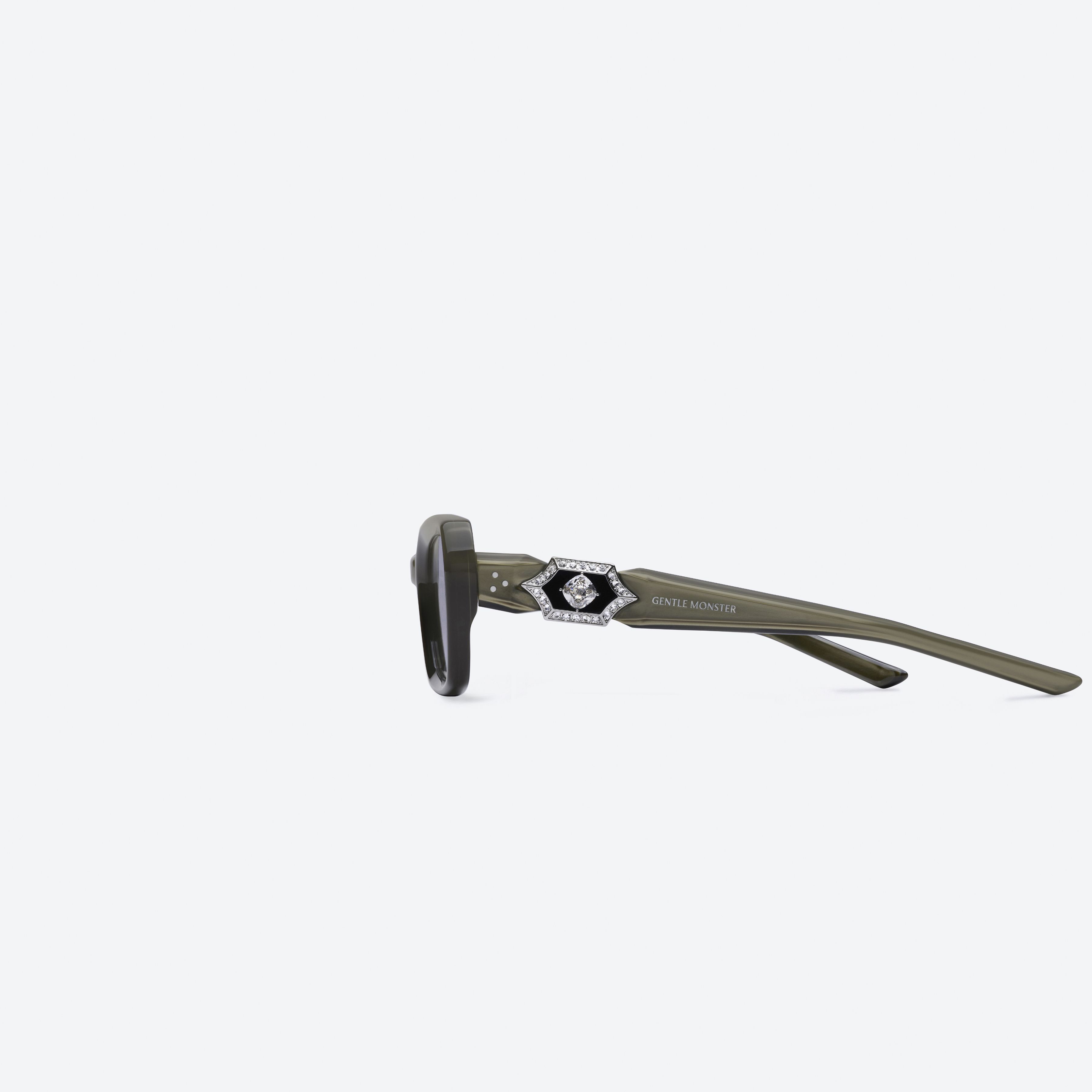A detailed left view of Gentle Monster Phantom BRC16 Brown Acetate framed Square sunglasses.