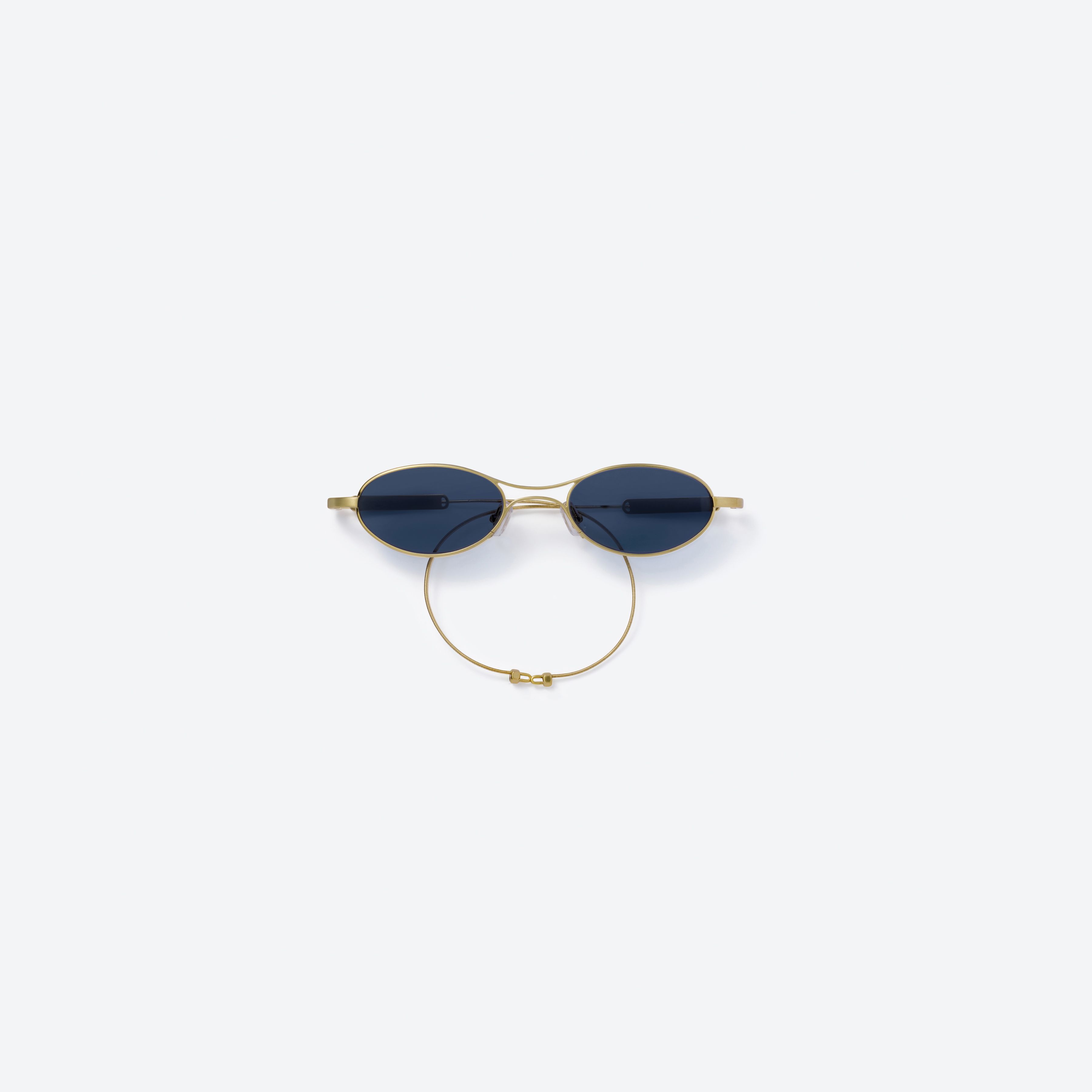 45-degree view of Gentle Monster MM220 A030(N) Gold Metal framed Oval glasses.