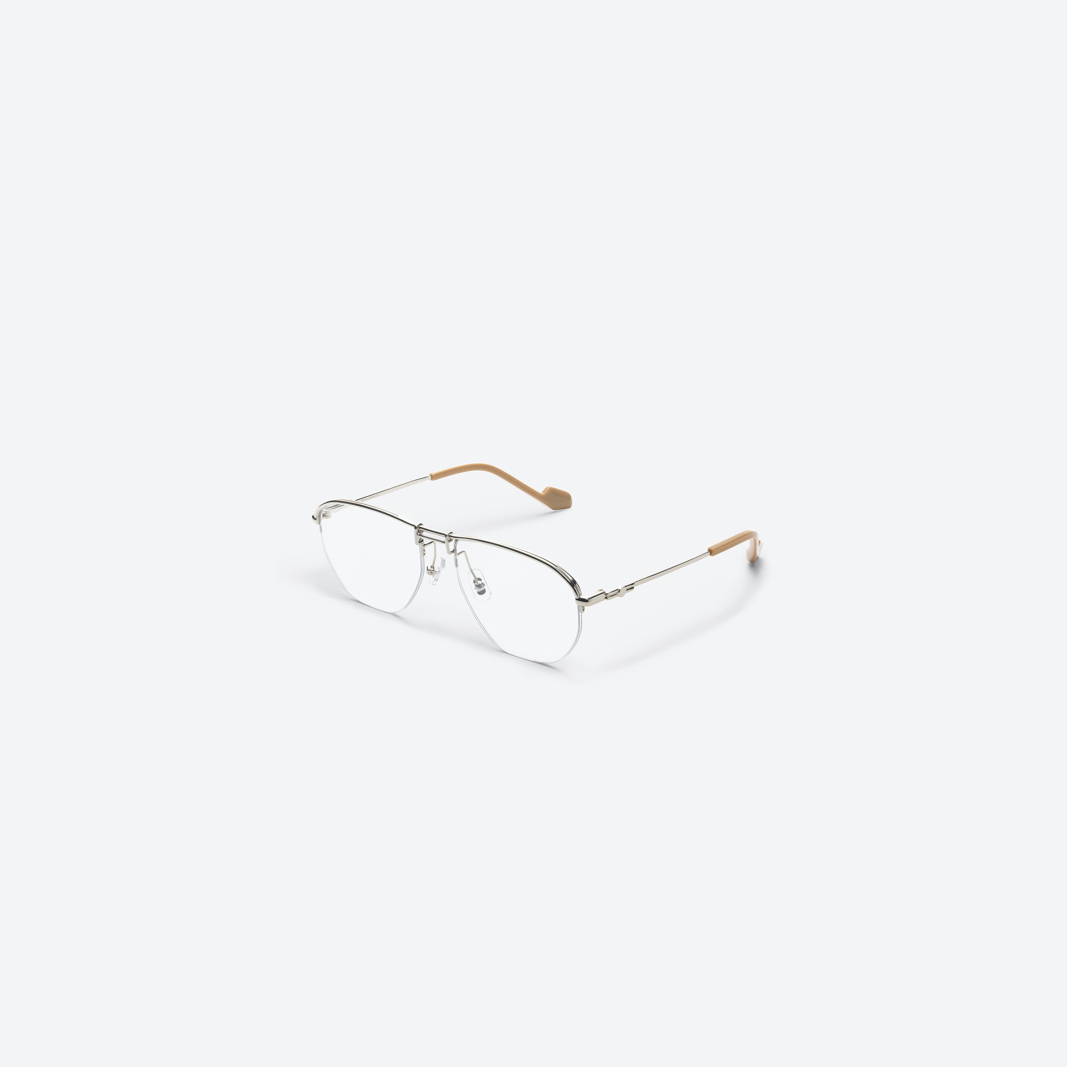 45-degree view of Gentle Monster Idris 02 Silver Metal framed Aviator glasses.