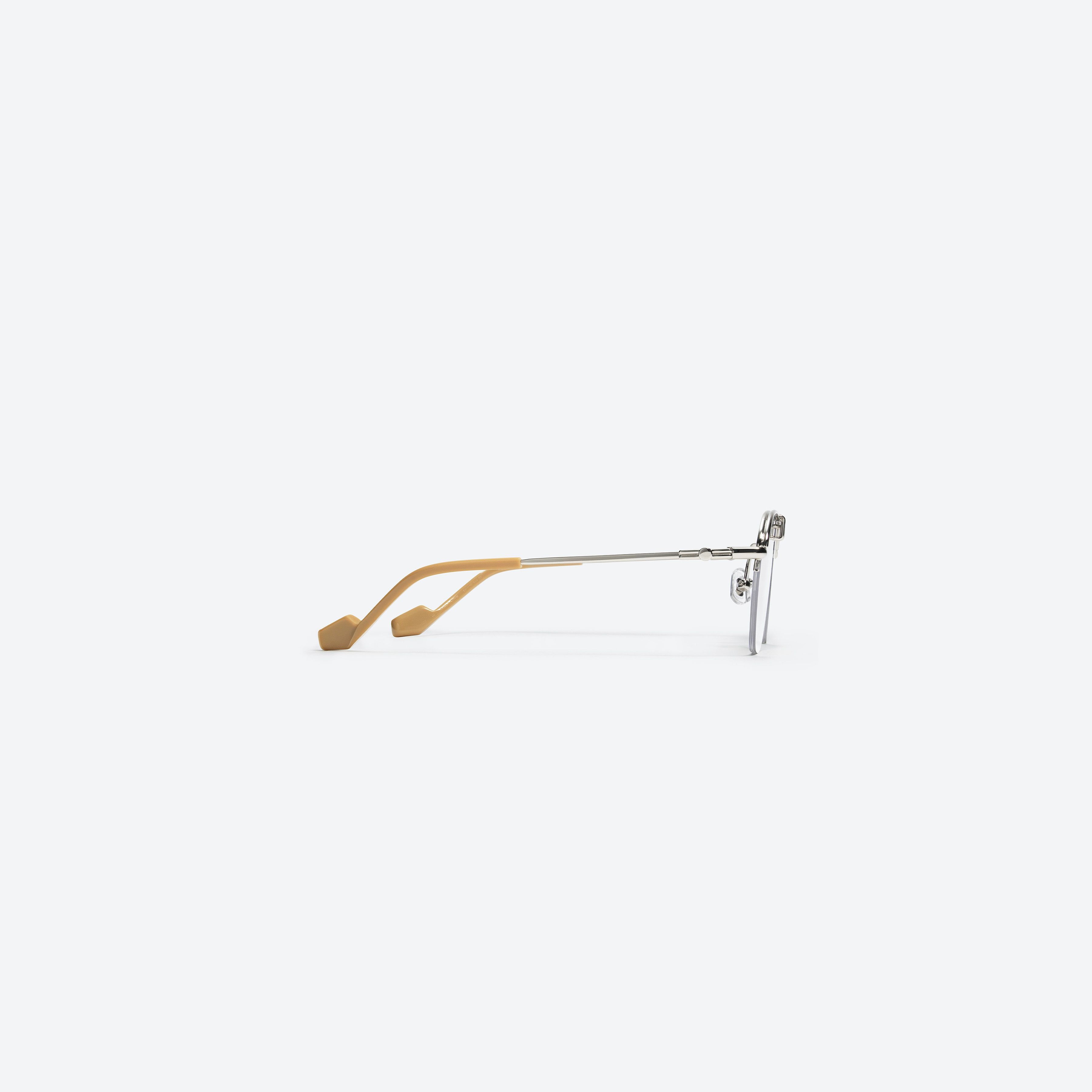 A detailed right view of Gentle Monster Idris 02 Silver Metal framed Aviator glasses.