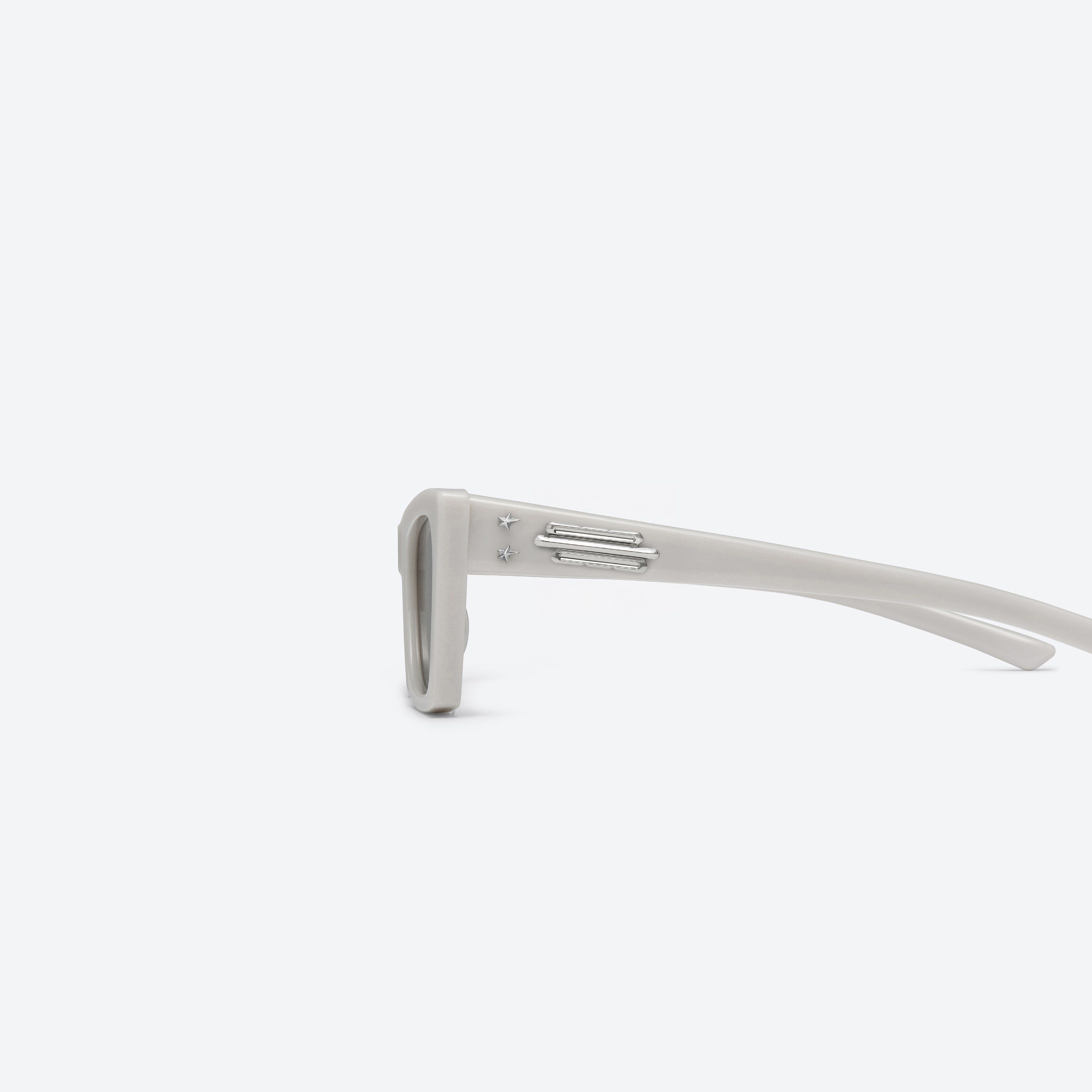 A detailed left view of Gentle Monster Jennie - Baby Pony G7 Gray Acetate framed Cat-eye sunglasses.