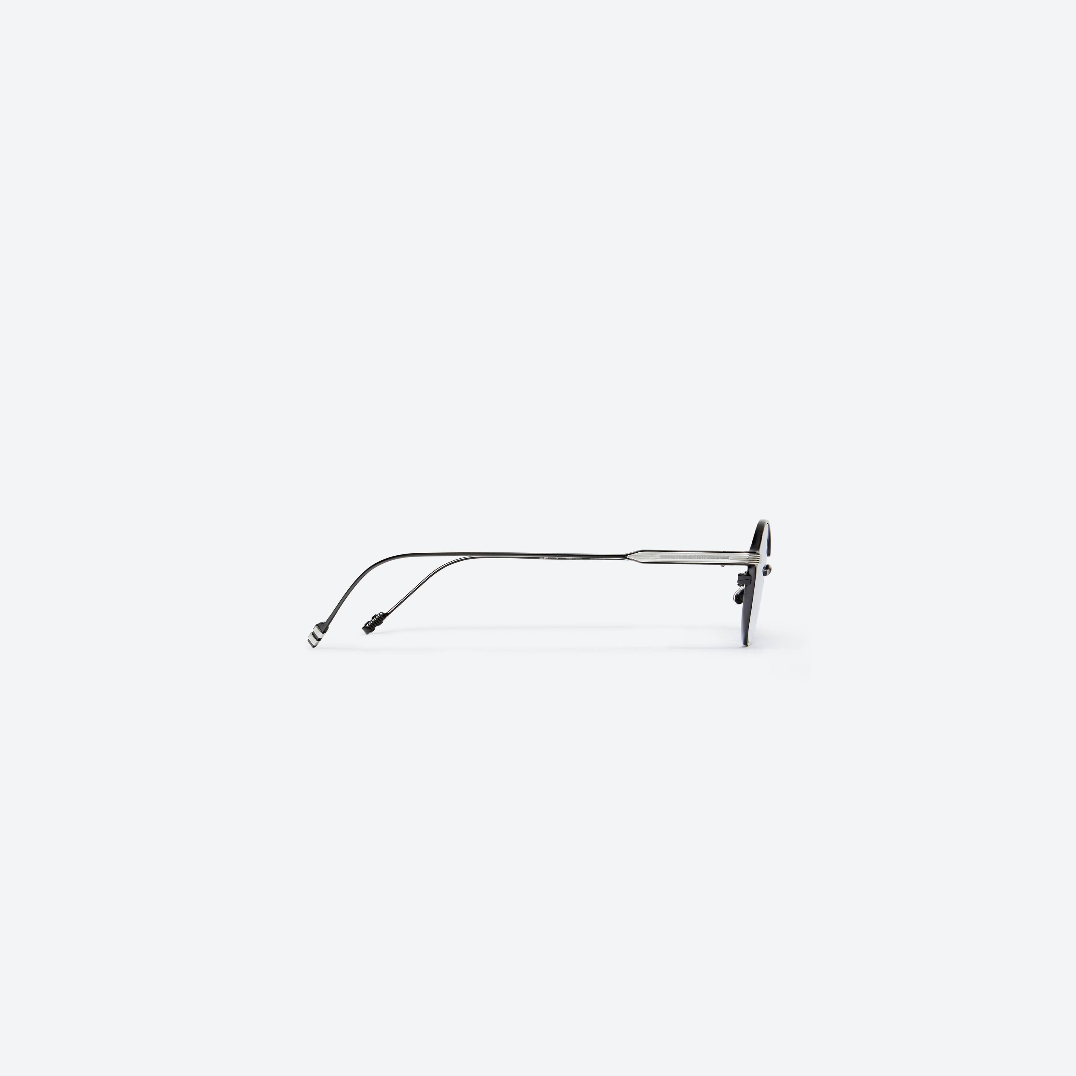 A detailed right view of Gentle Monster ZITTER M01(B) Black Metal framed Oval glasses.