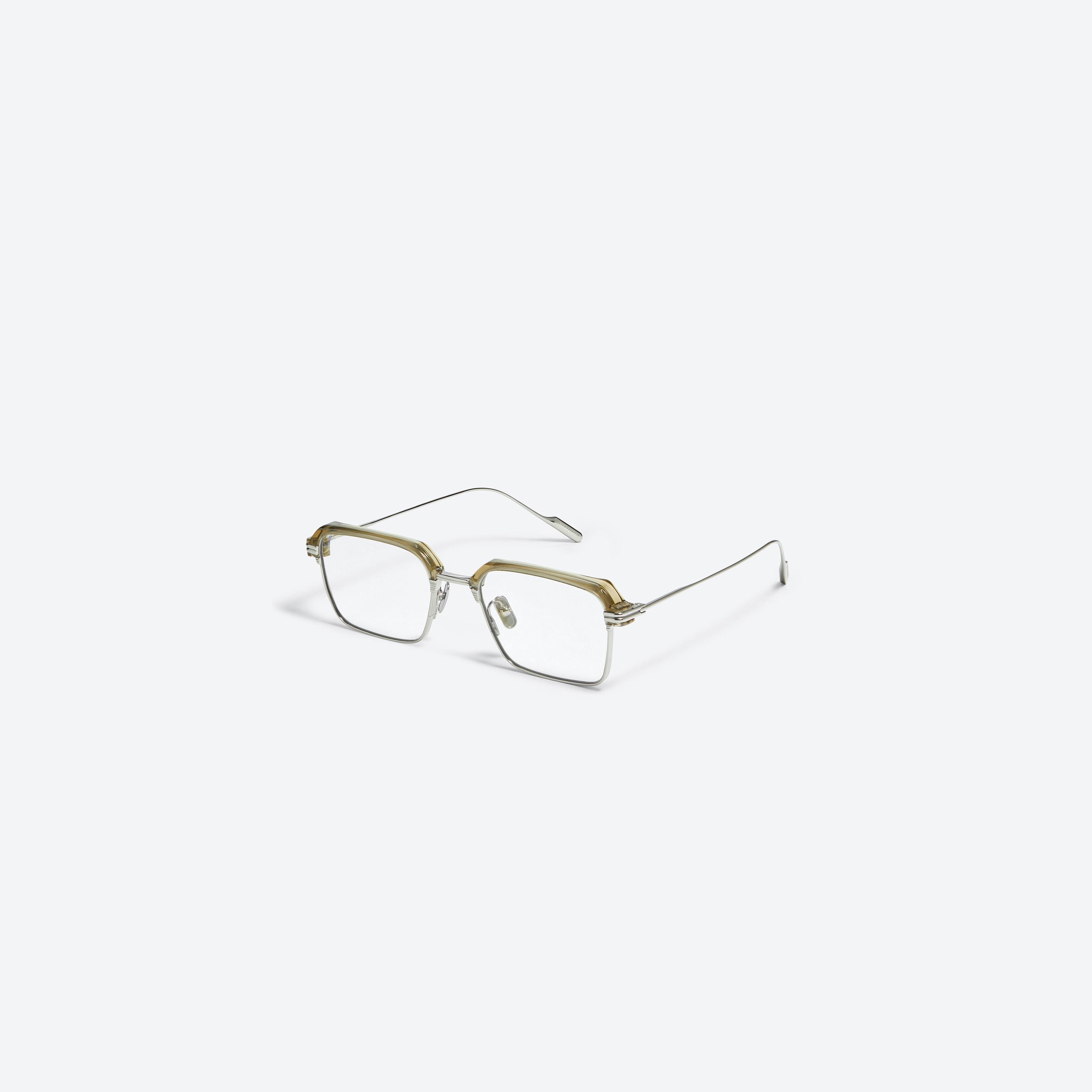 45-degree view of Gentle Monster Look.YK KC1 Green Mixed framed Square glasses.