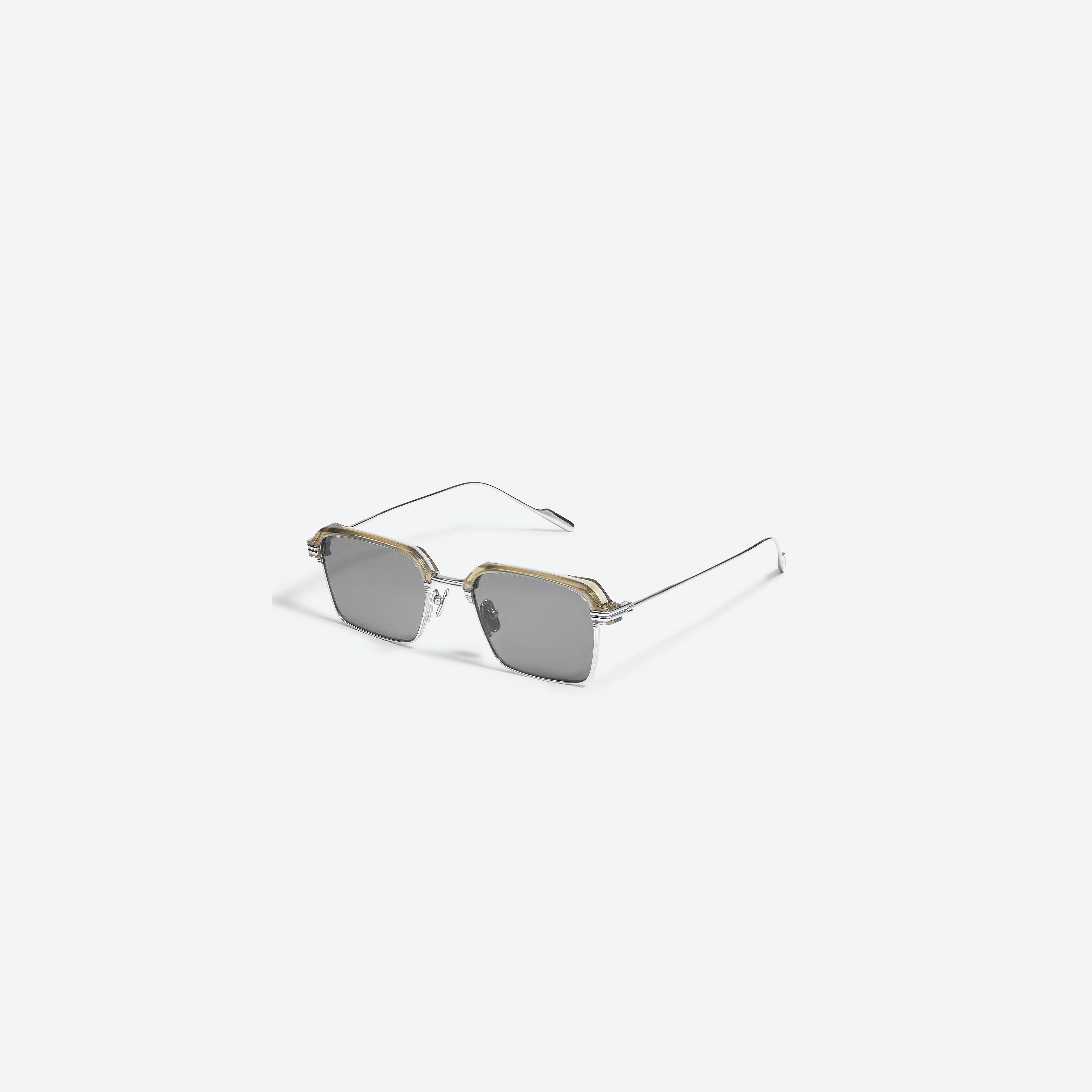 45-degree view of Gentle Monster Look.YK KC1(G) Green Mixed framed Square glasses.