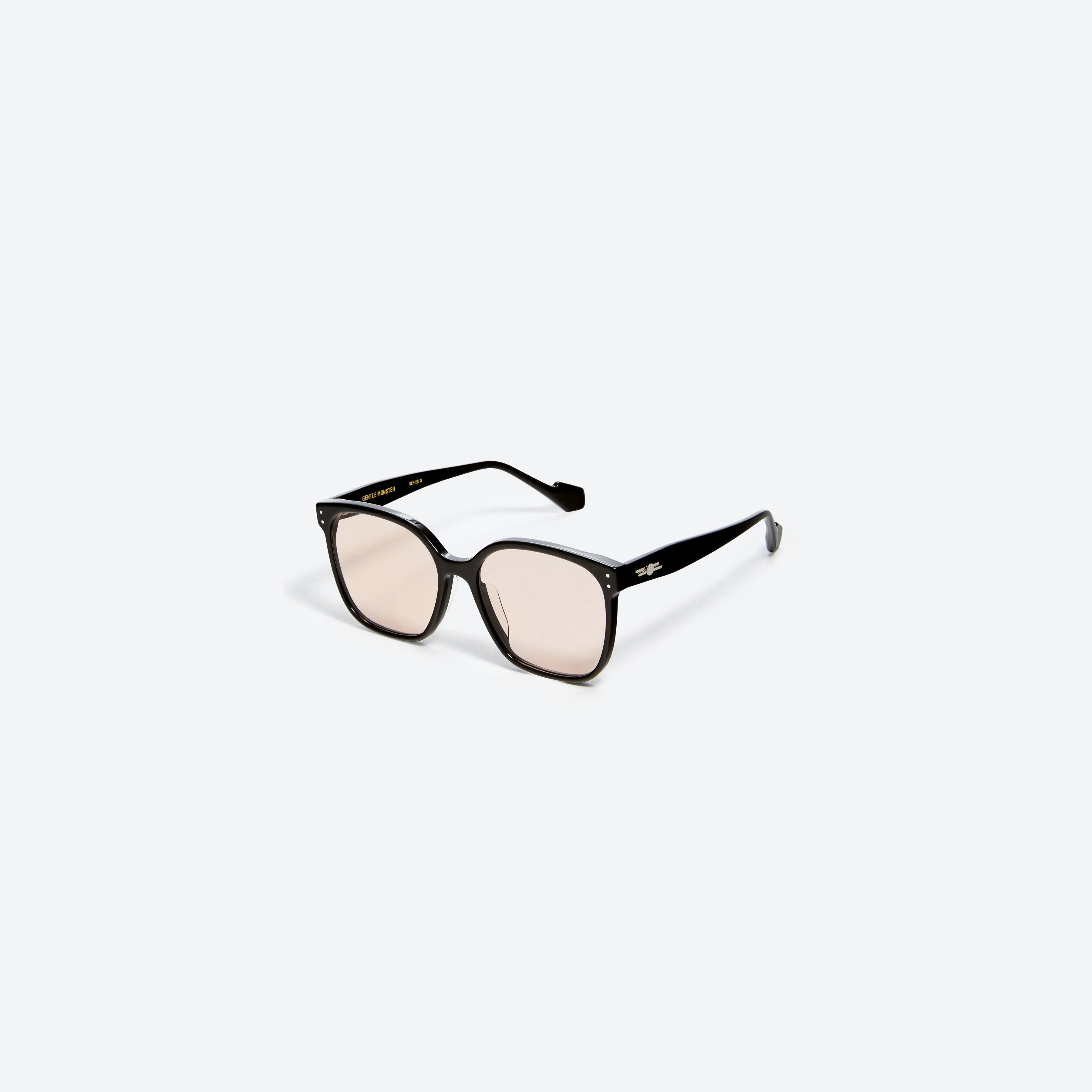 45-degree view of Gentle Monster Ata 01(P) Black Acetate framed Square glasses.
