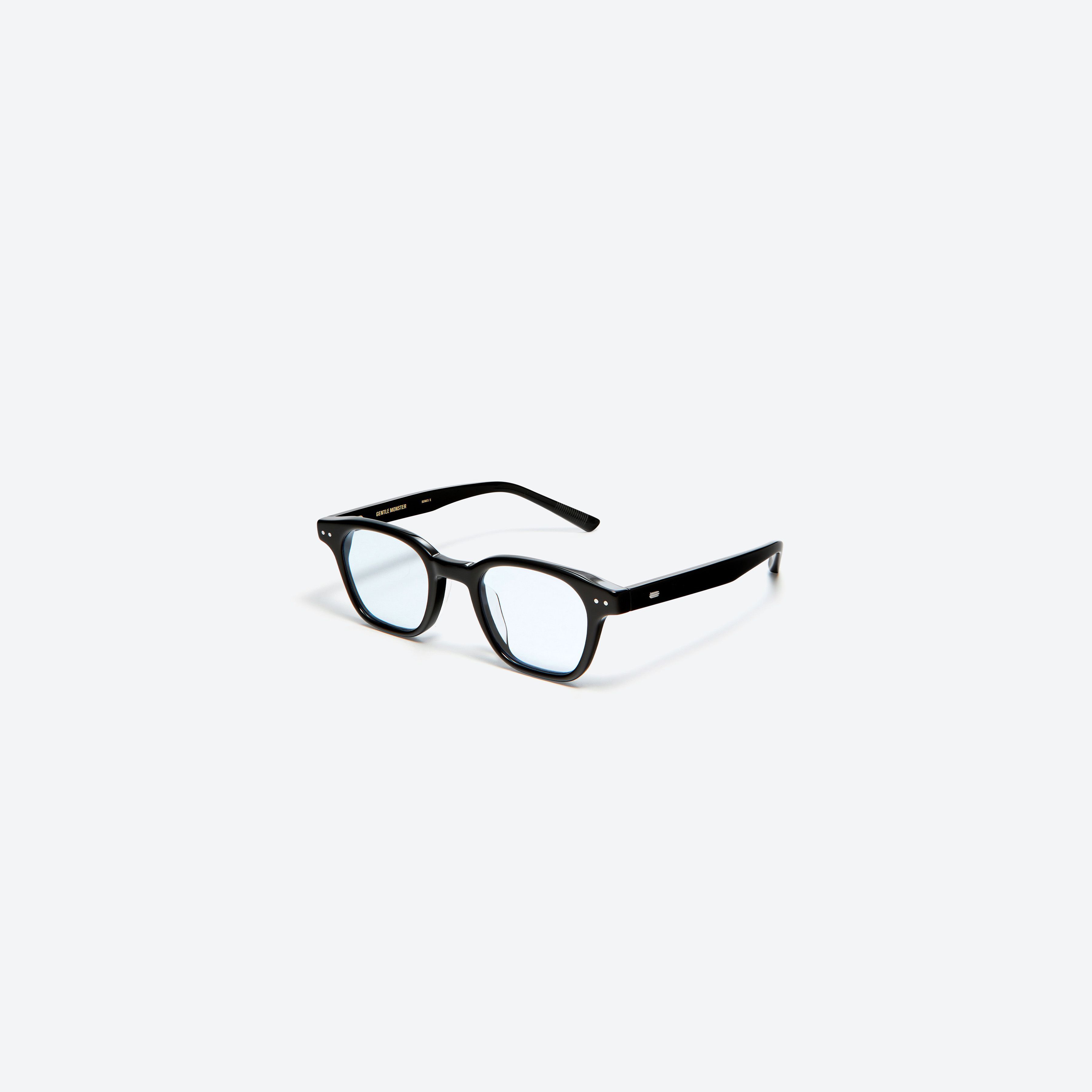 45-degree view of Gentle Monster Cato 01(B) Black Acetate framed Square glasses.