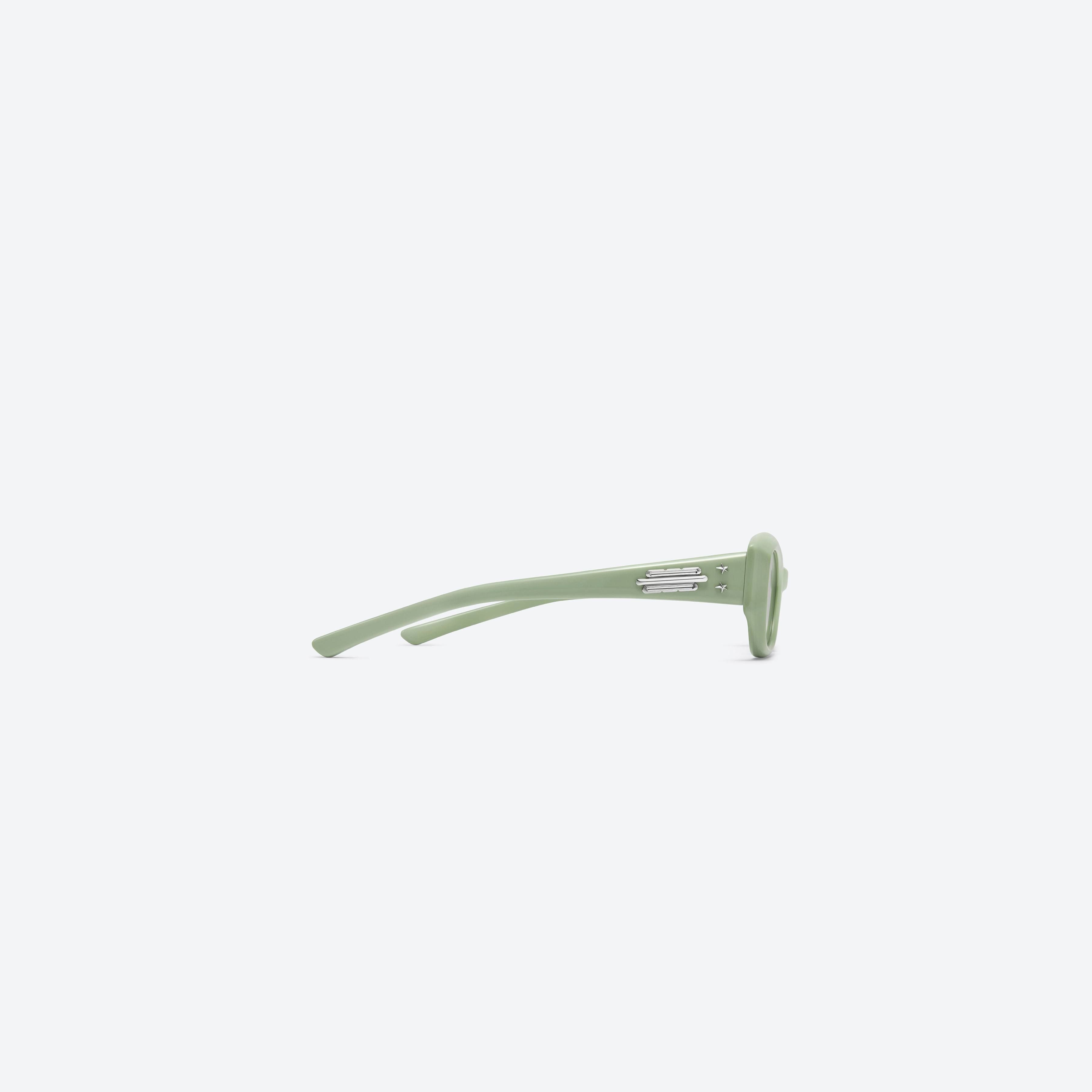 A detailed right view of Gentle Monster Jennie - Wispy GR8 Green Acetate framed Square sunglasses.