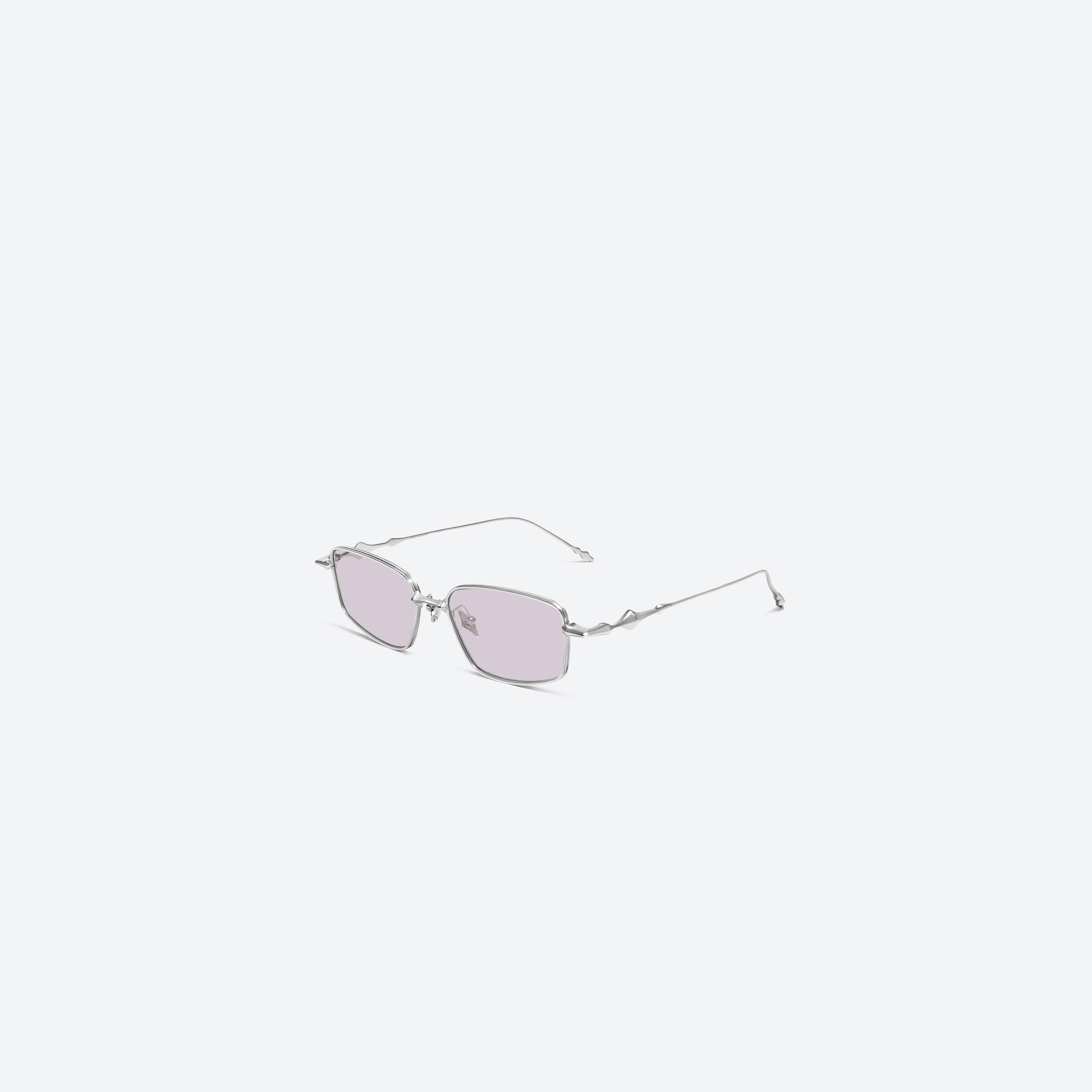 45-degree view of Gentle Monster ATOMIC 02(V) Silver Metal framed Square glasses.