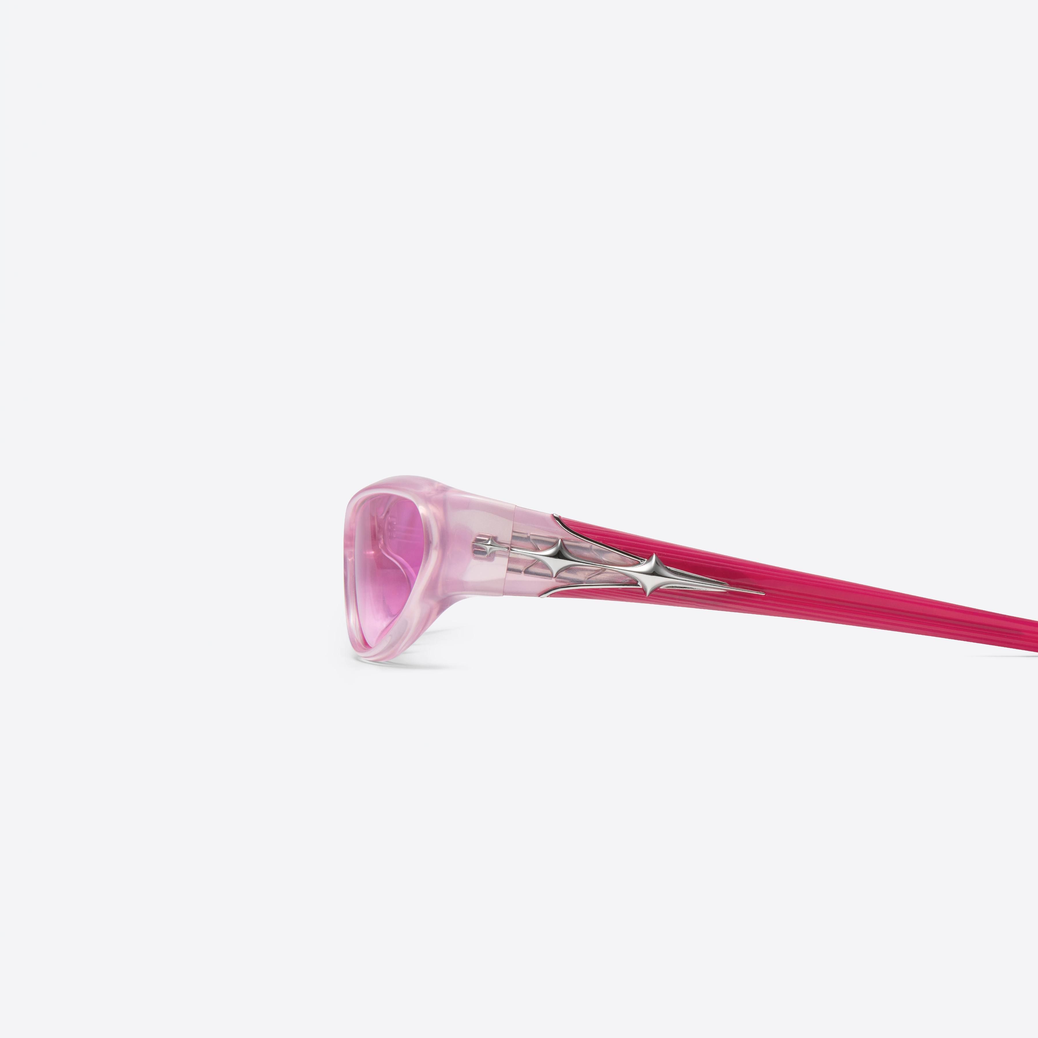A detailed left view of Gentle Monster Limitless SPC9 Pink Acetate framed Wraparound sunglasses.