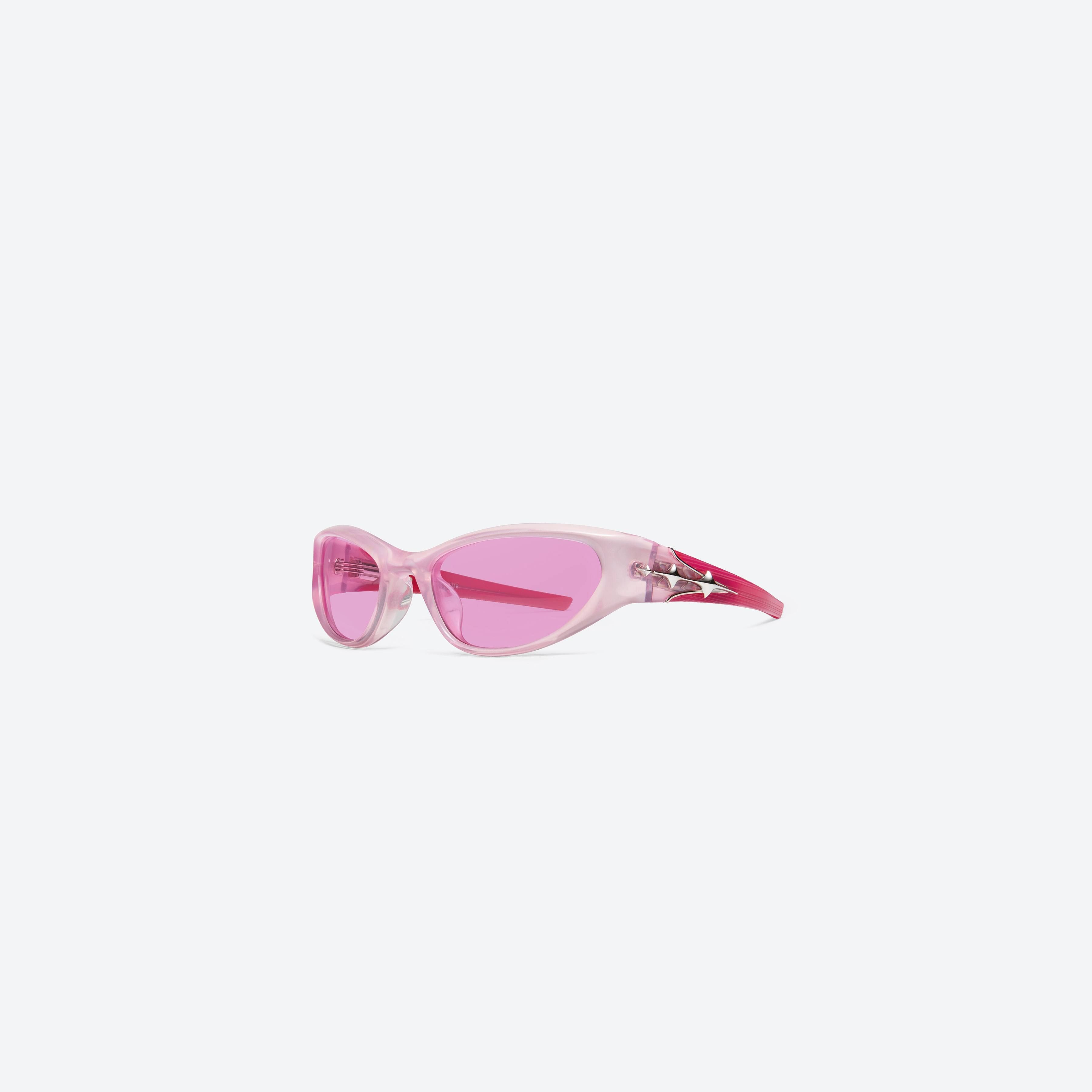 45-degree view of Gentle Monster Limitless SPC9 Pink Acetate framed Wraparound sunglasses.