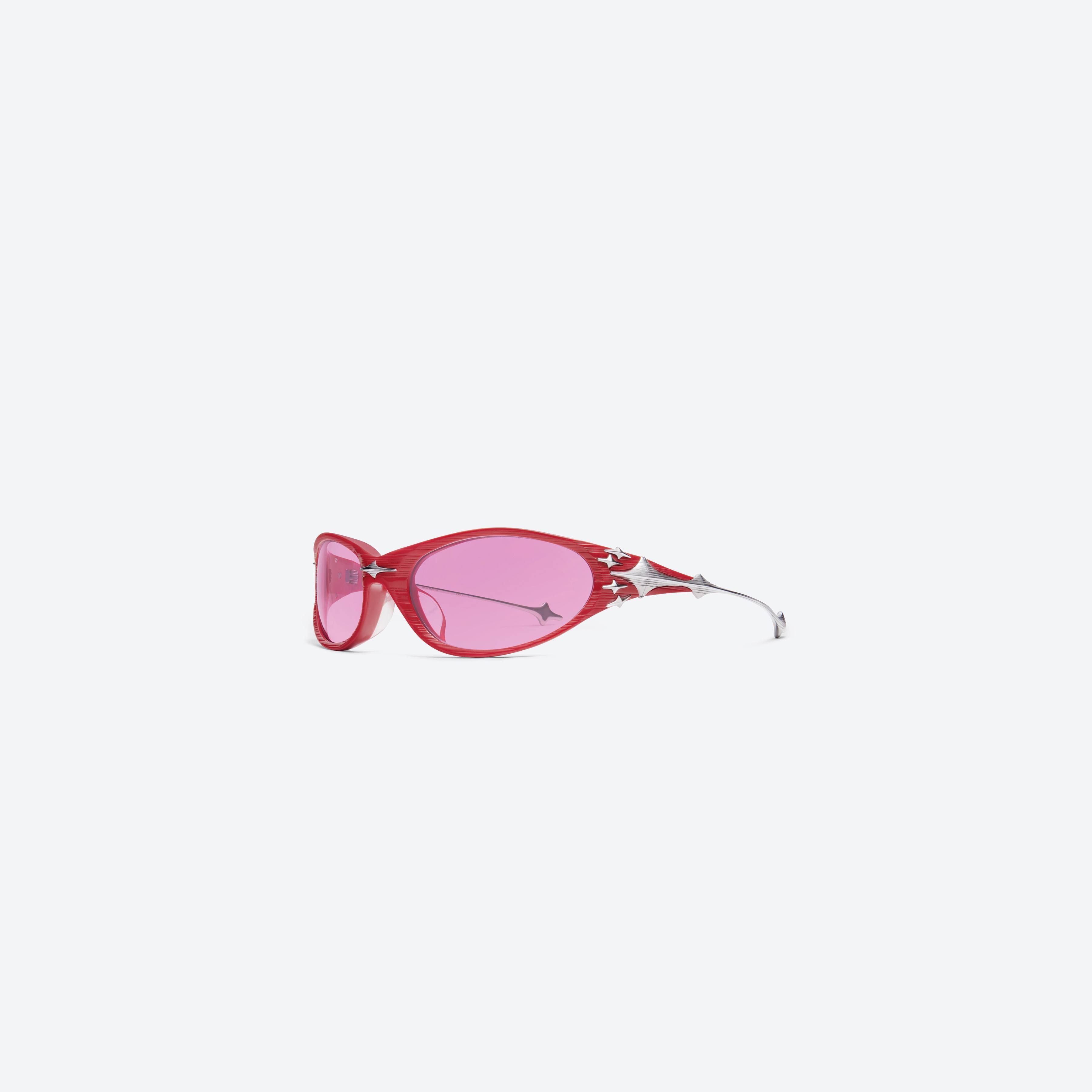 45-degree view of Gentle Monster Ex SR3 Red Mixed framed Wraparound sunglasses.