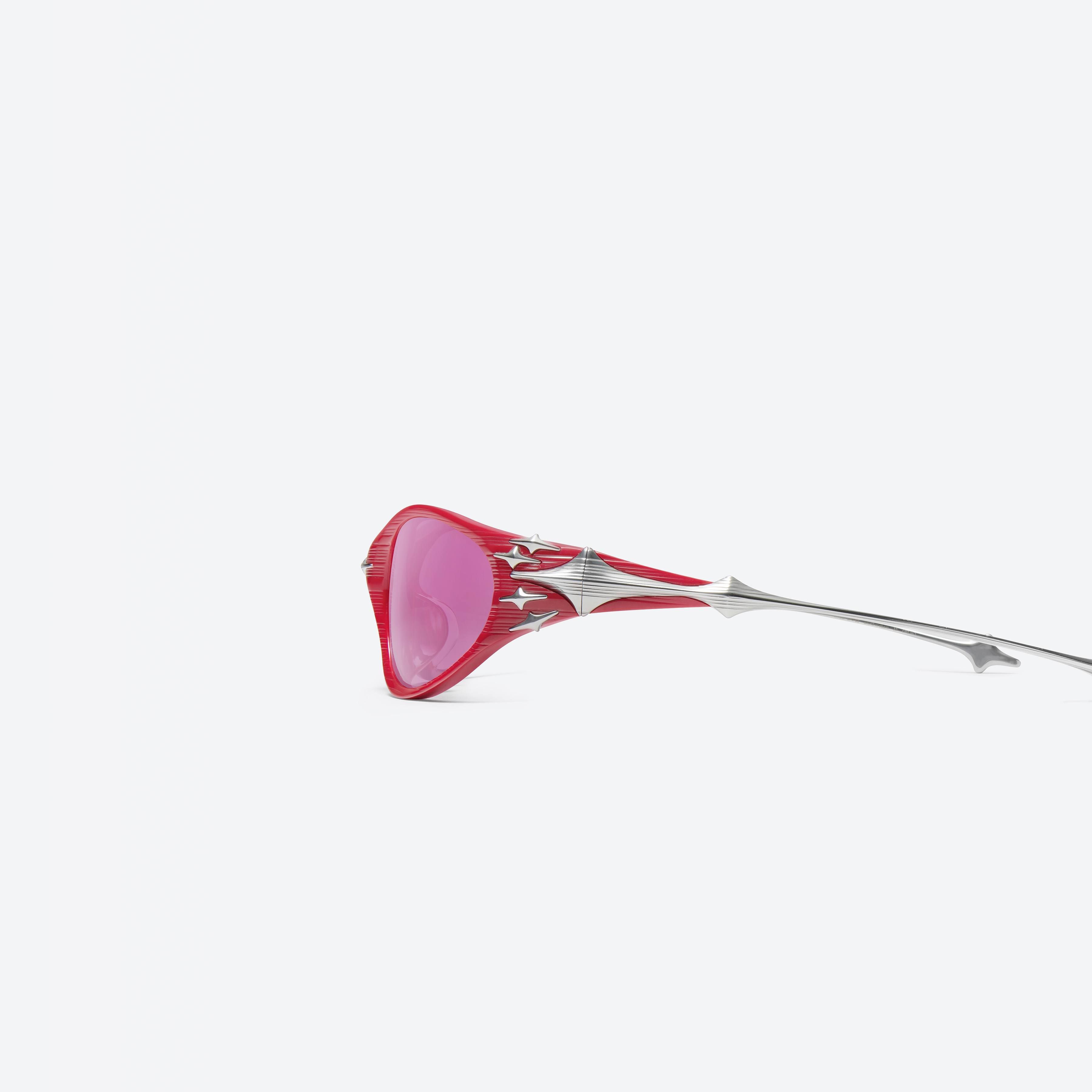 A detailed left view of Gentle Monster Ex SR3 Red Mixed framed Wraparound sunglasses.