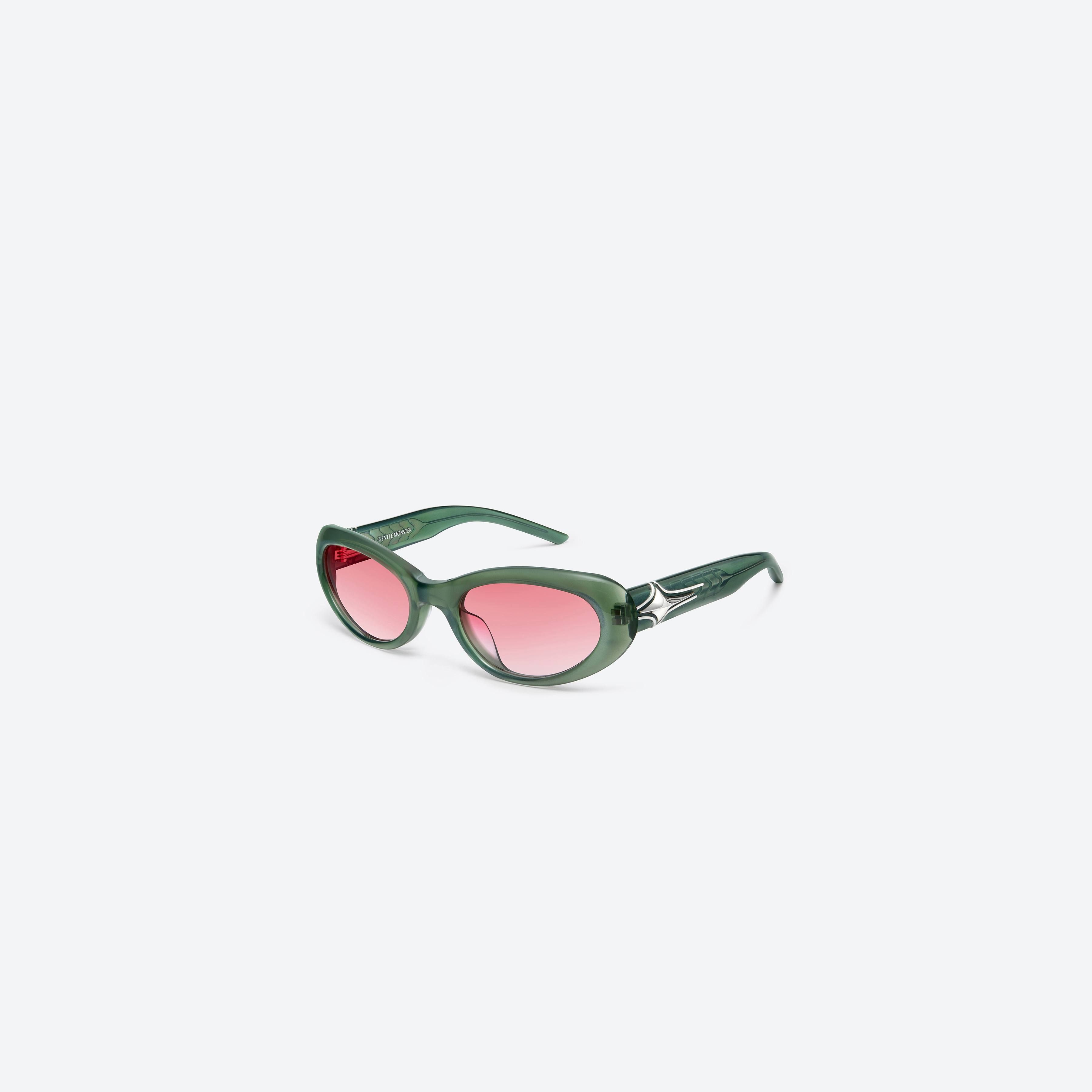 45-degree view of Gentle Monster Fear X GR9 Green Acetate framed Oval sunglasses.
