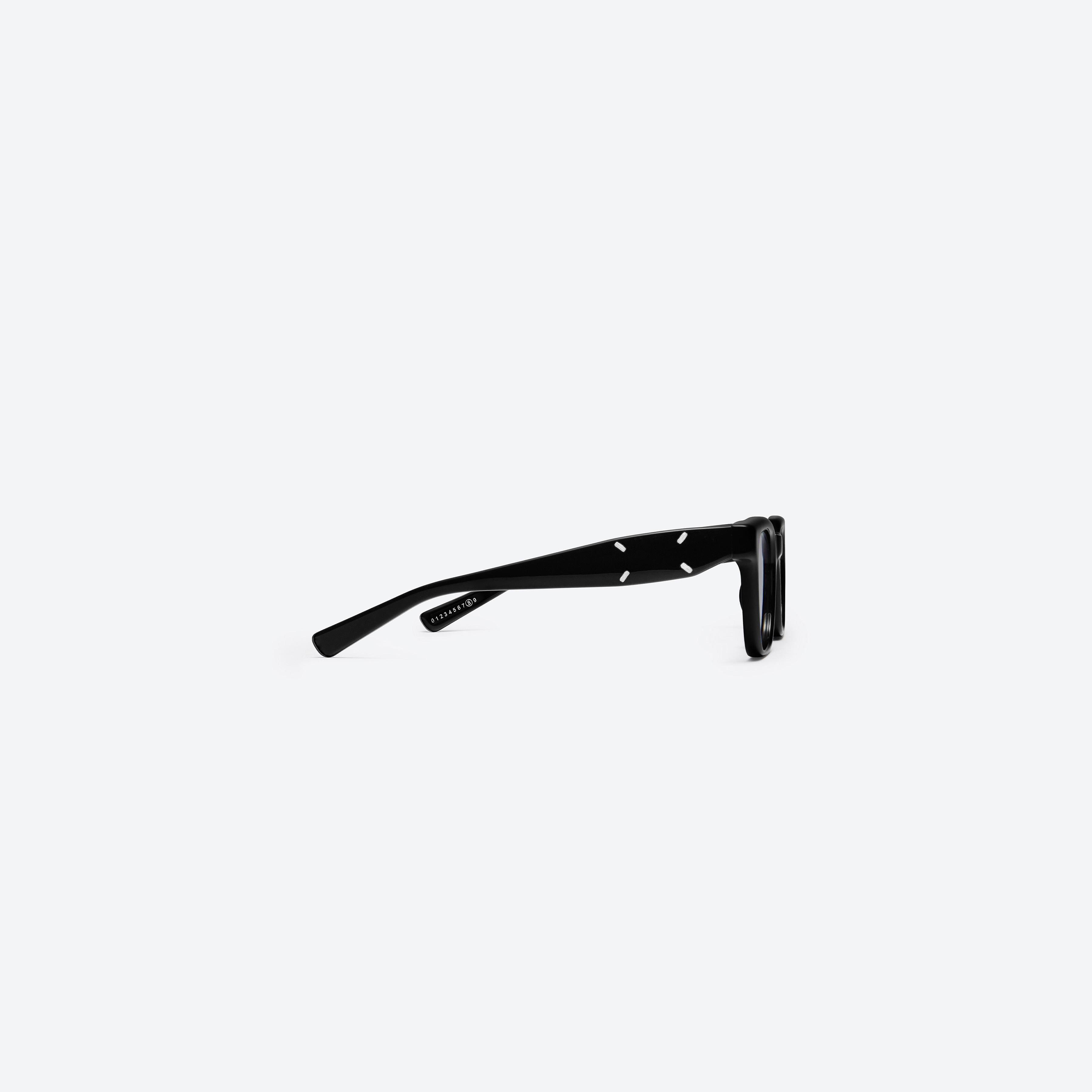 A detailed right view of Gentle Monster MM110 01 Black Acetate framed Square sunglasses.