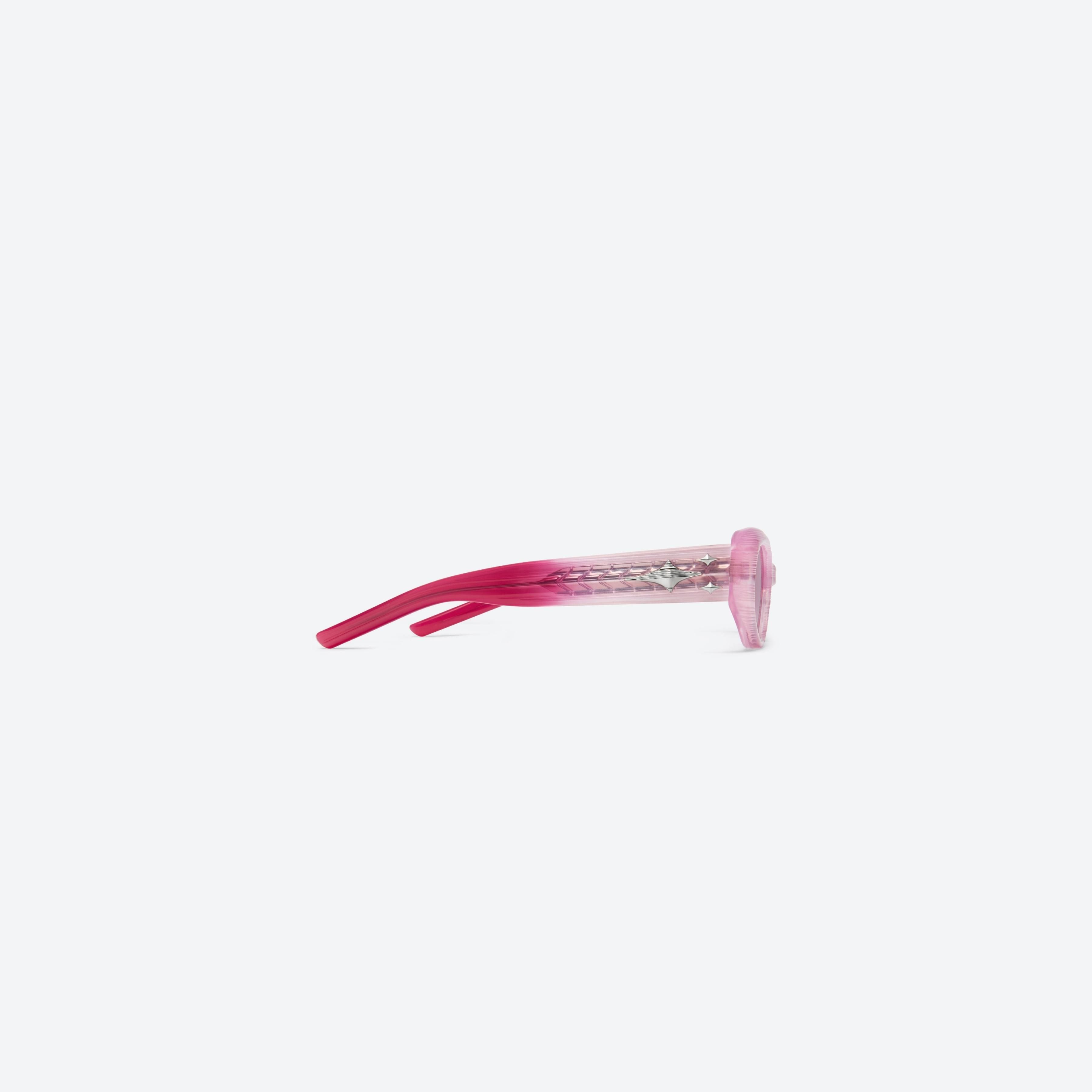 A detailed right view of Gentle Monster Cuff SPC9 Pink Acetate framed Oval sunglasses.