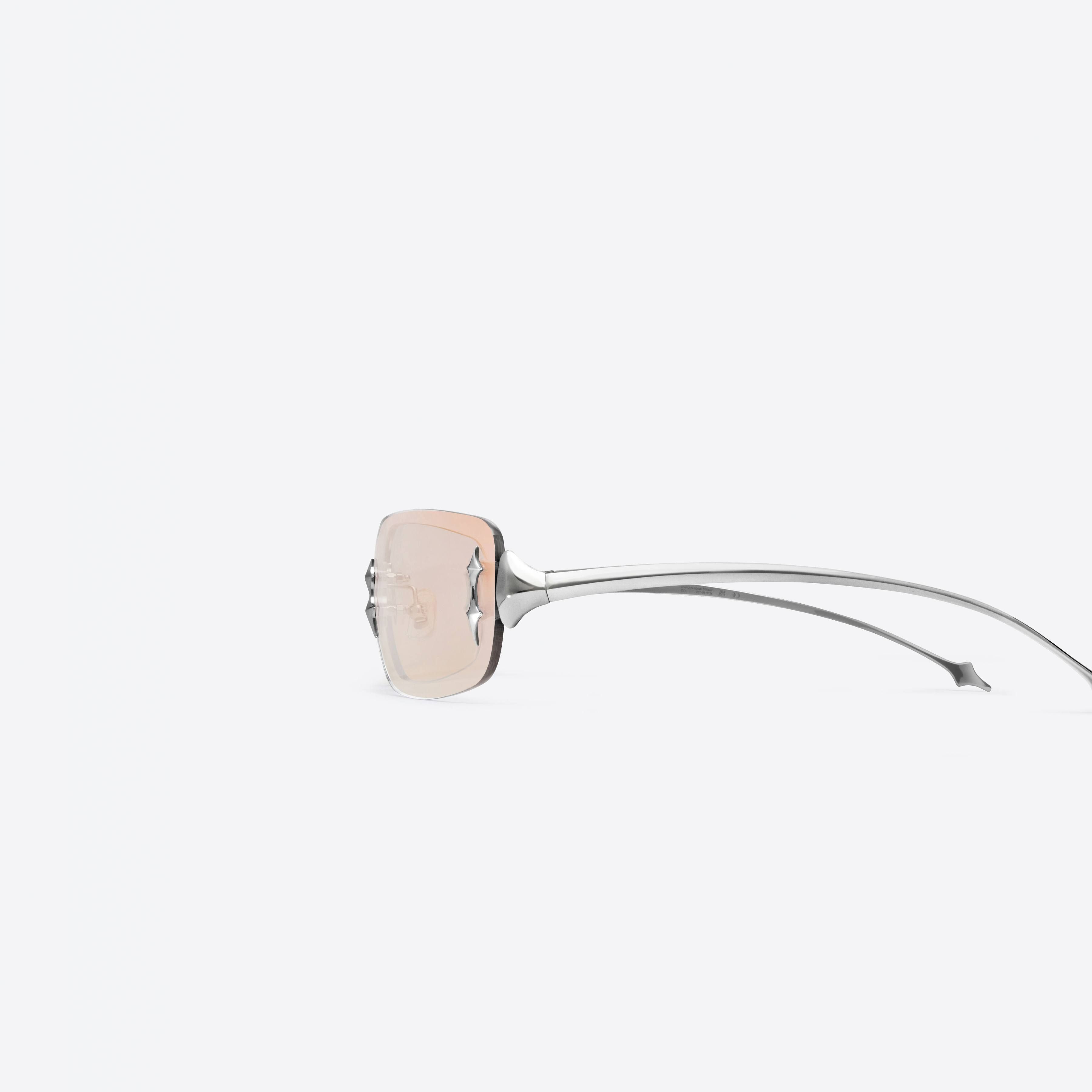 A detailed left view of Gentle Monster Ttl 02 Silver Metal framed Square sunglasses.