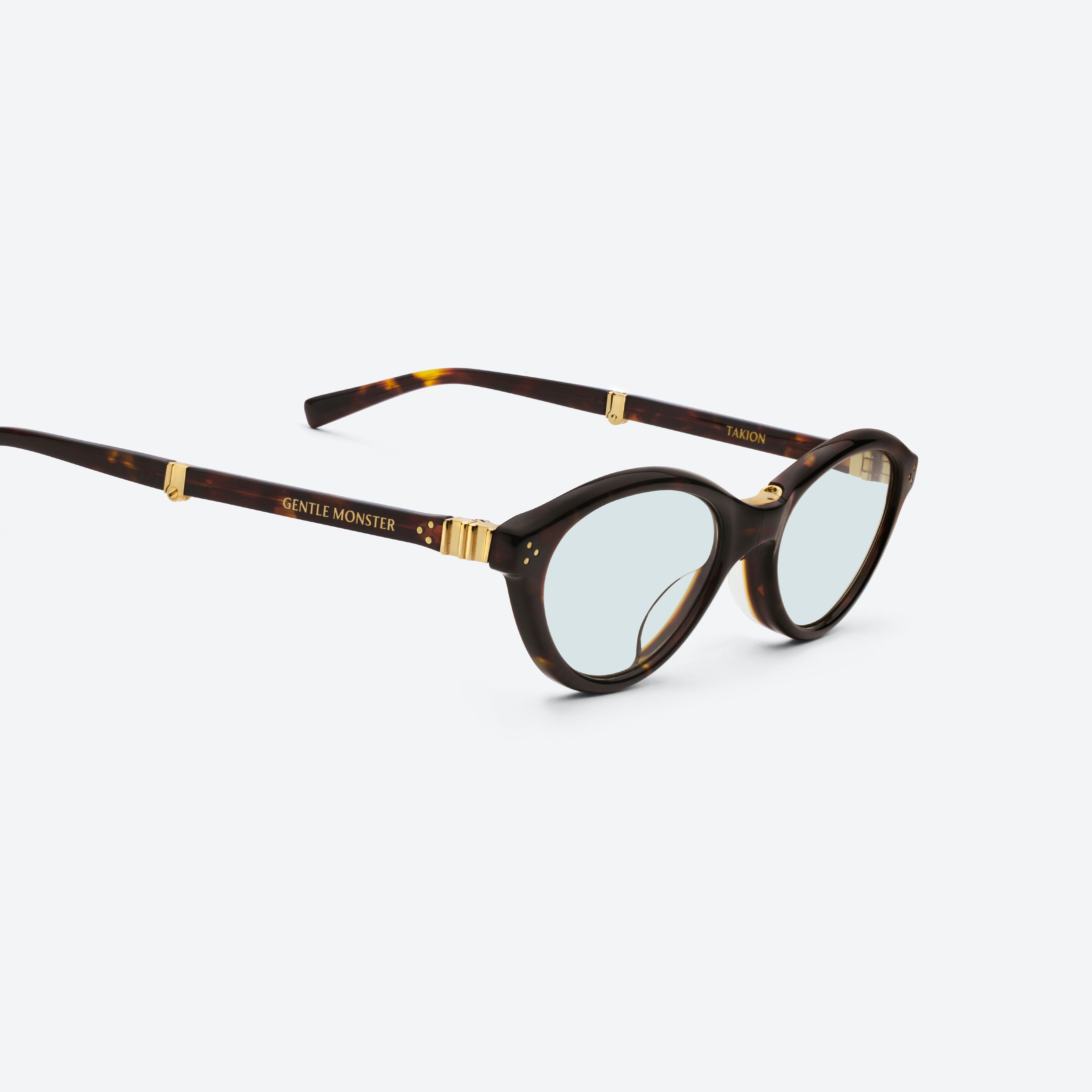 45-degree detailed view of Gentle Monster TAKION T1 Tortoise Mixed framed Round glasses.