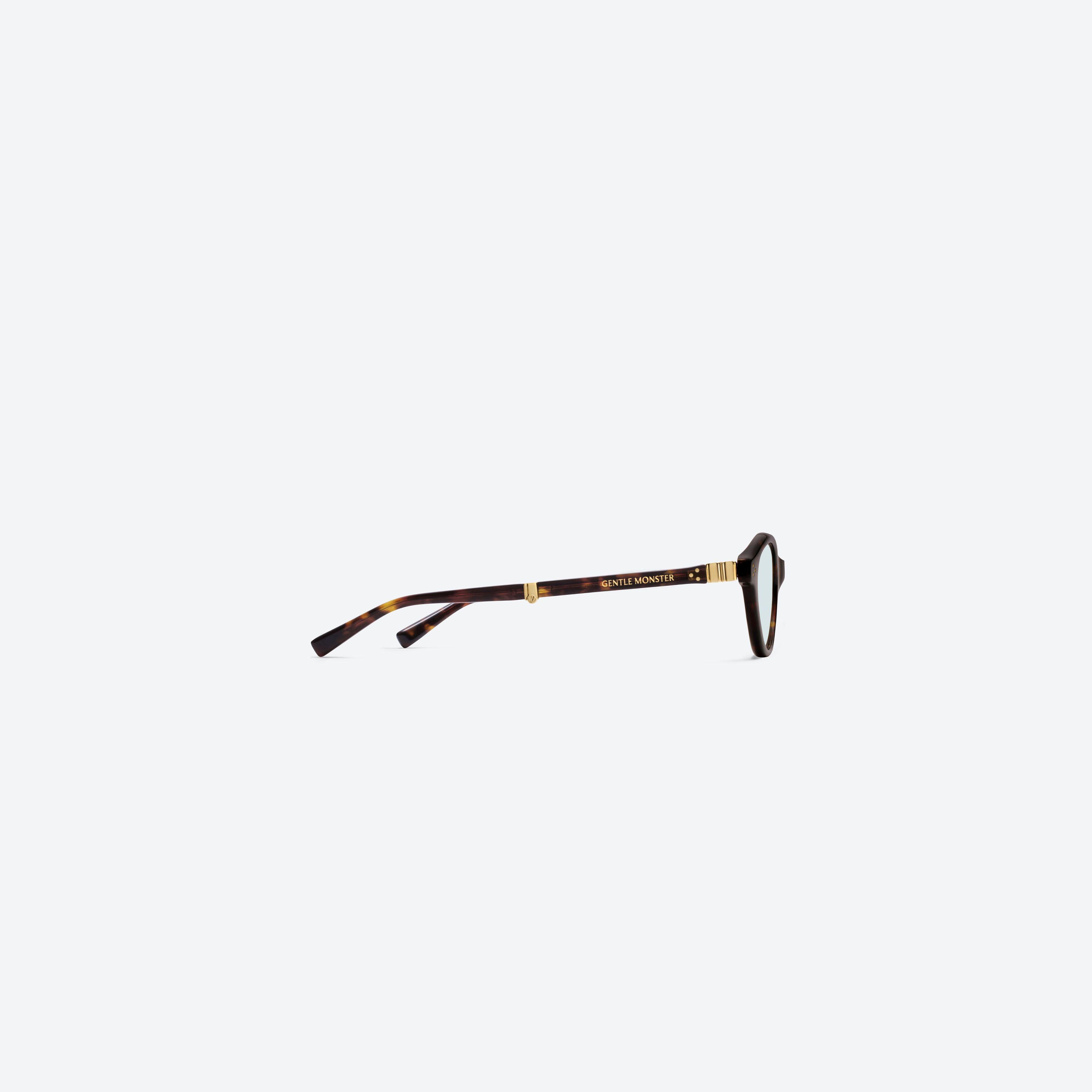 A detailed right view of Gentle Monster TAKION T1 Tortoise Mixed framed Round glasses.